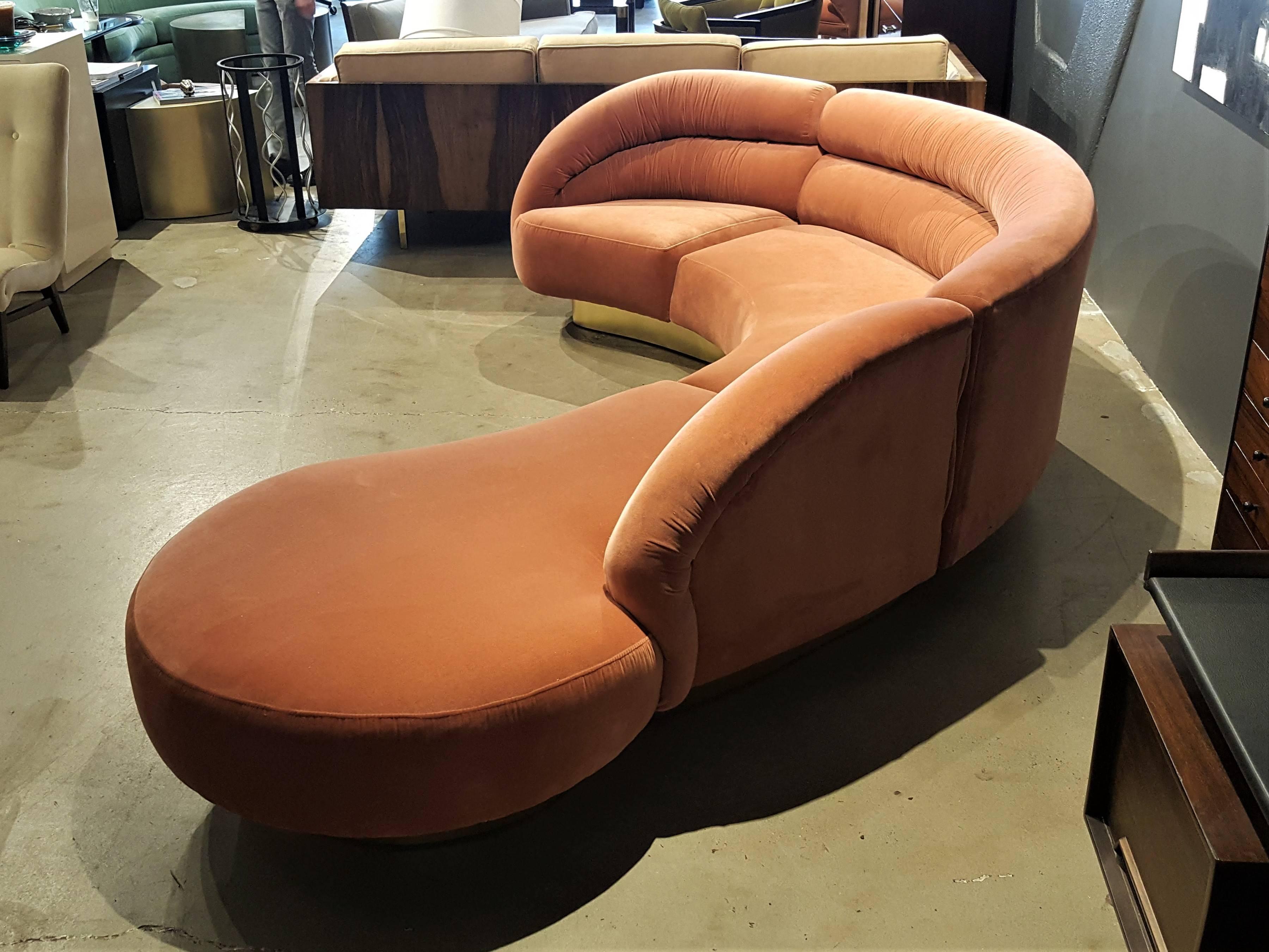 Absolutely sensational biomorphic sofa by Directional Furniture and in the style of Vladimir Kagan. Gorgeous channeling to the back follows the original lines of the piece. Reupholstered in a plush cotton blend velvet in a stunning warm blush tone