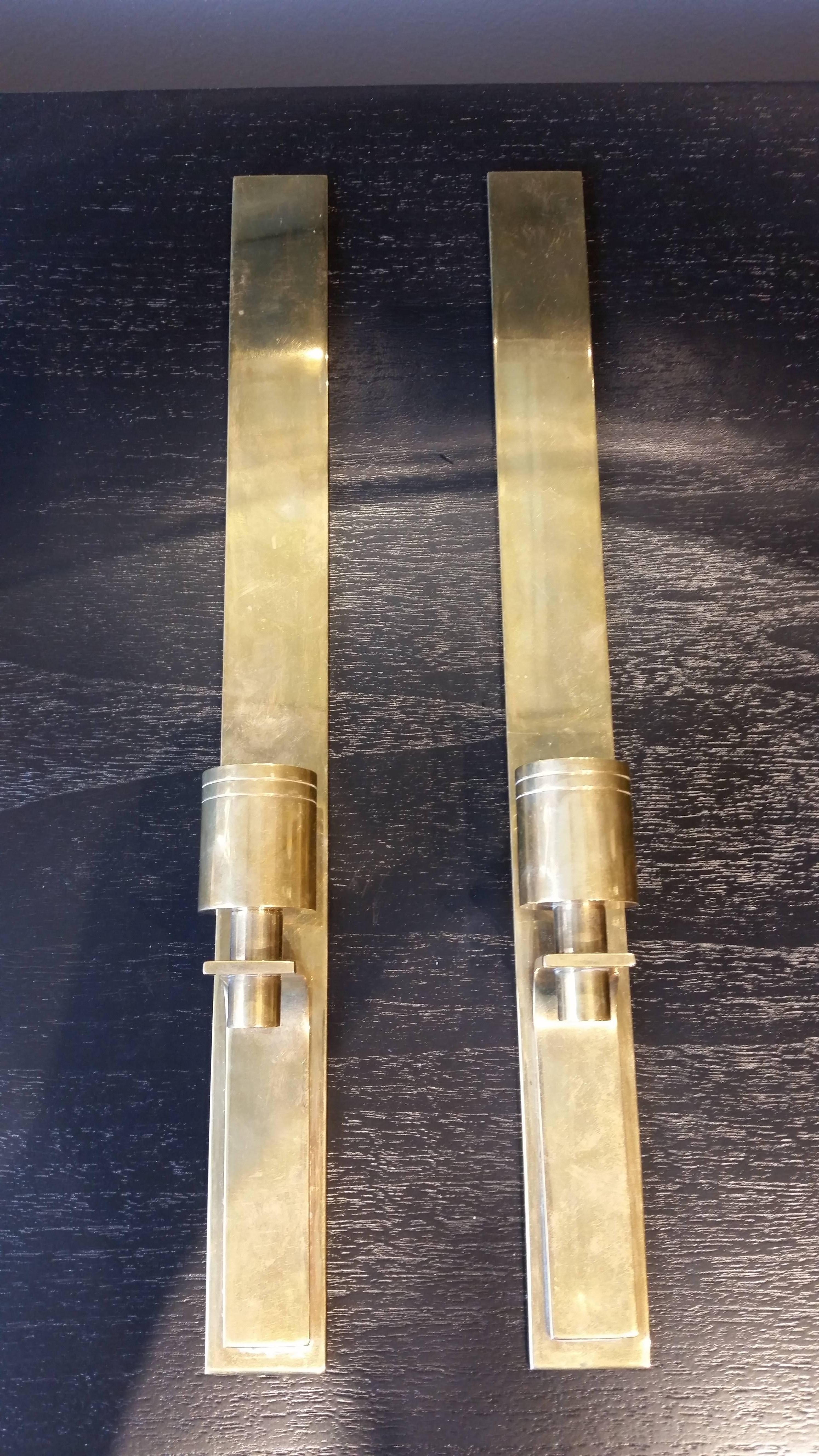 Sleek Danish Modern Pair of Brass Wall-Mounted Candleholders, Denmark, 1960s  In Excellent Condition In New York, NY
