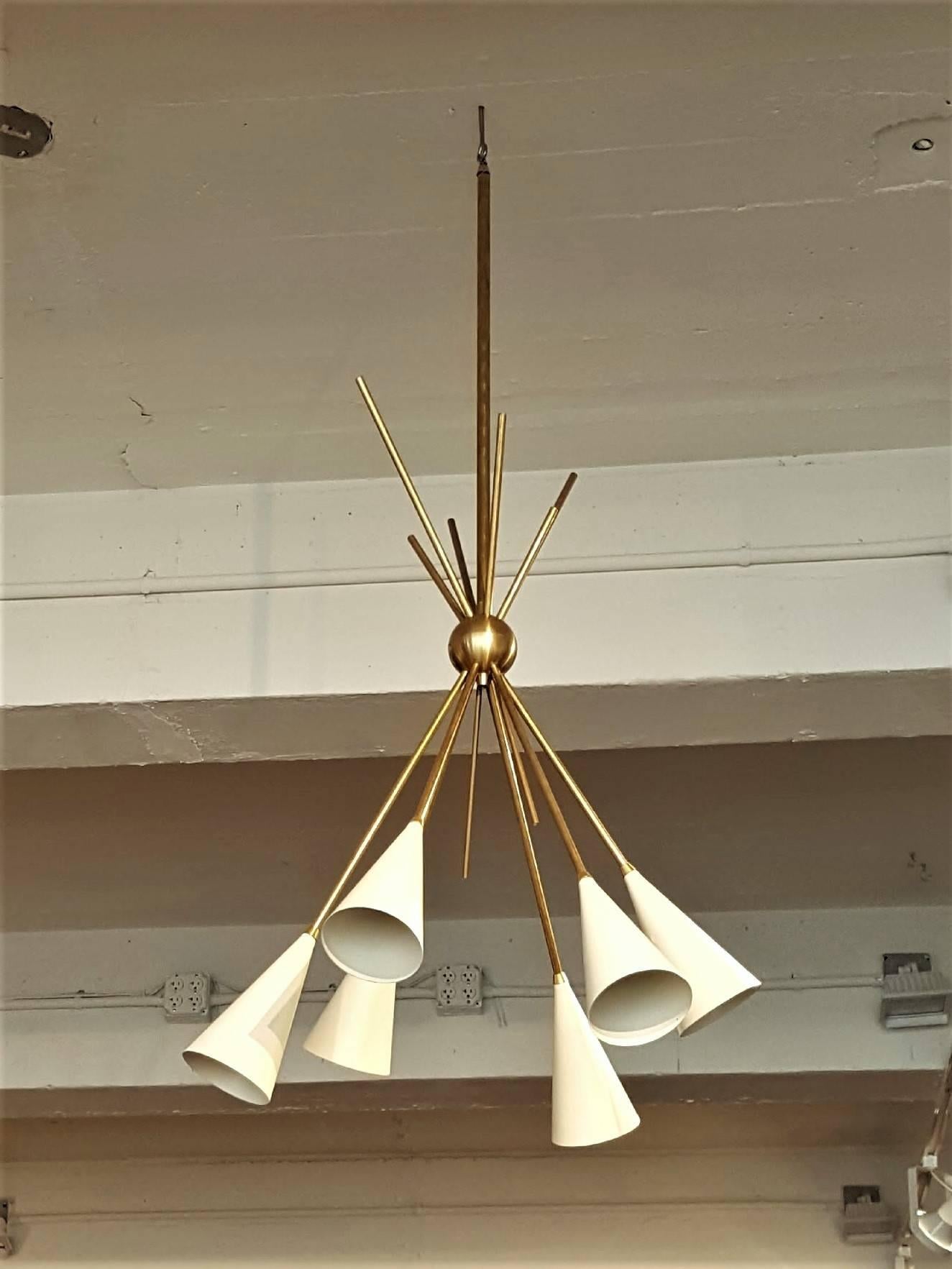 Handcrafted in NYC by Studio Machina for Blueprint Lighting, our 'Bouquet' Chandelier is a stunning statement piece with design elements of both Italian or French modernism and Hollywood glam.  Chandelier as pictured features a custom antique