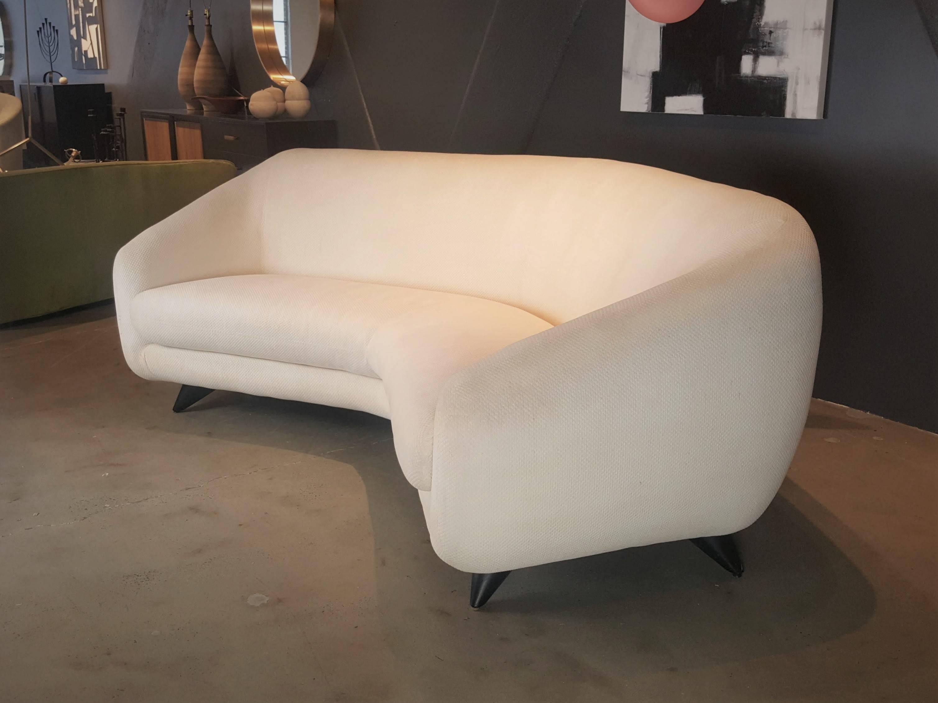 Extremely rare "Tangent" sofa by Vladimir Kagan for Weiman's preview furniture line. This sofa is outrageously comfortable and inviting, yet sleek and sculptural, it is always so difficult to find the perfect marriage of comfort and beauty