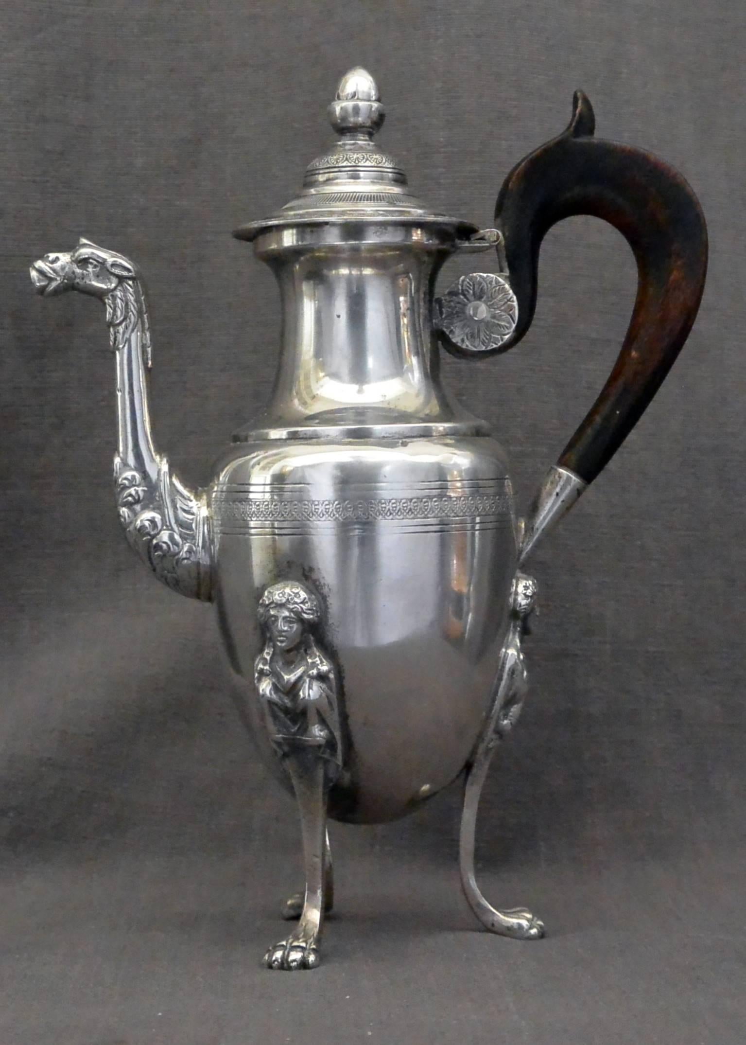 Italian Neoclassical silver coffee pot and sugar bowl.  Italian Neoclassical Silver Coffee Pot and Sugar Bowl. Neapolitan caffettiera in sterling silver with wood handle of neoclassical form and decoration with acorn lid and camel spout of oviform