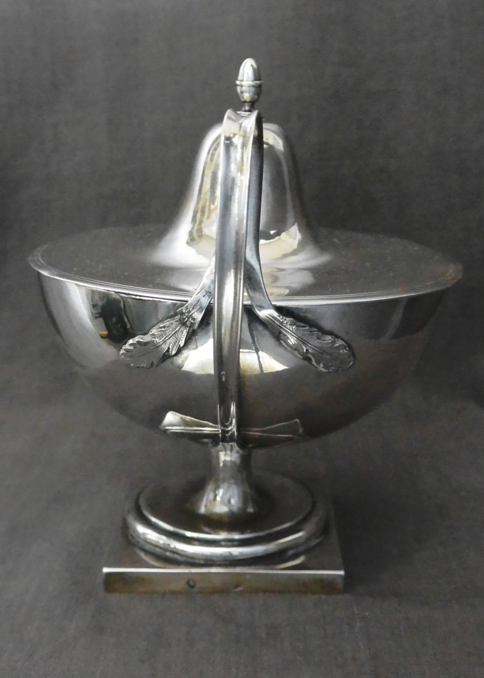  Italian Silver Neoclassical Lidded Urn. Italian neoclassical sterling silver urn form zucchiera. Handles with foliate terminals and lid with acorn finial all on footed pedestal base. Italy, circa 1780.
Dimension: handle to handle 7.75