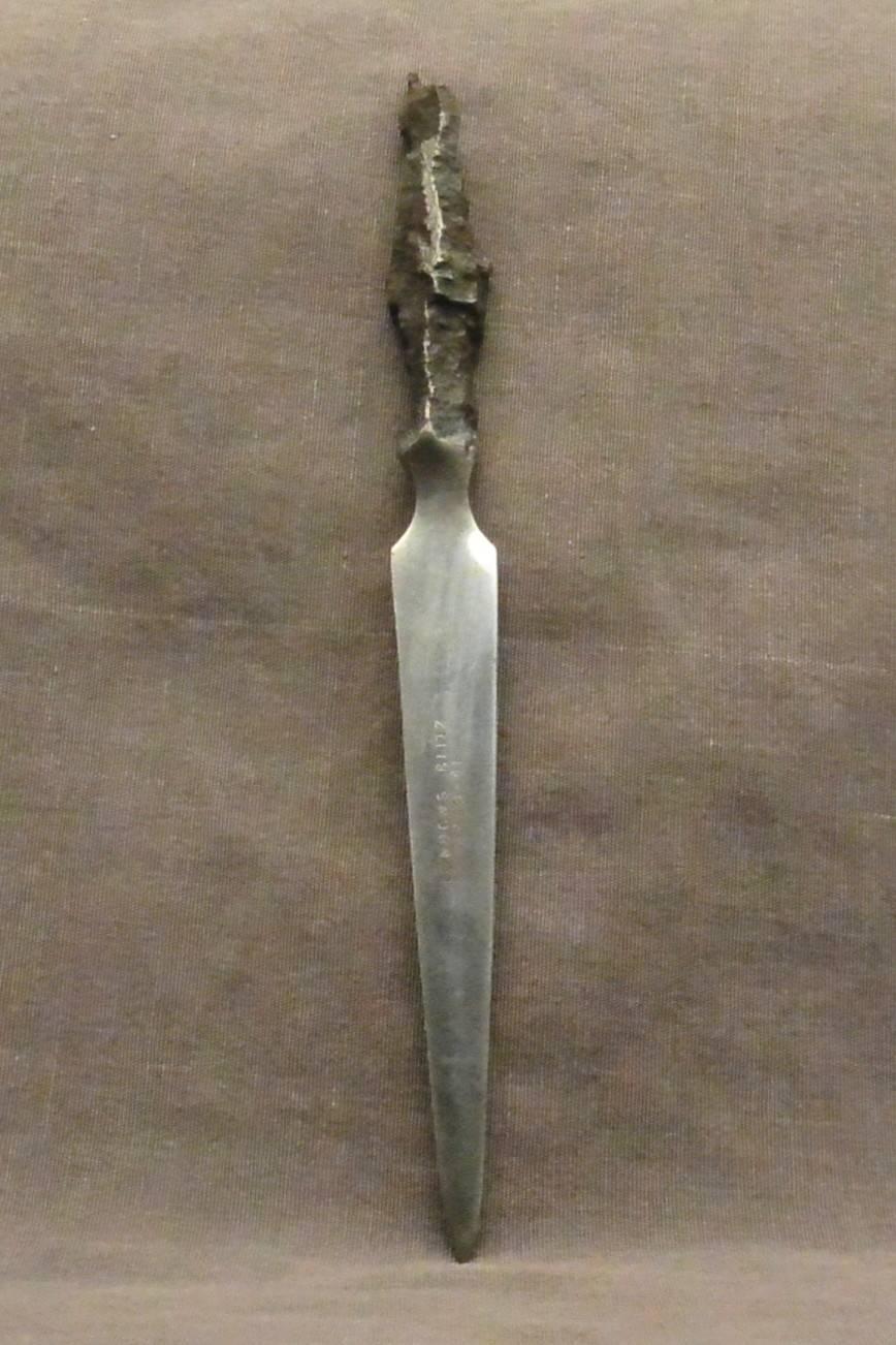 Vintage WWII letter opener made from steel and shrapnel, marked 