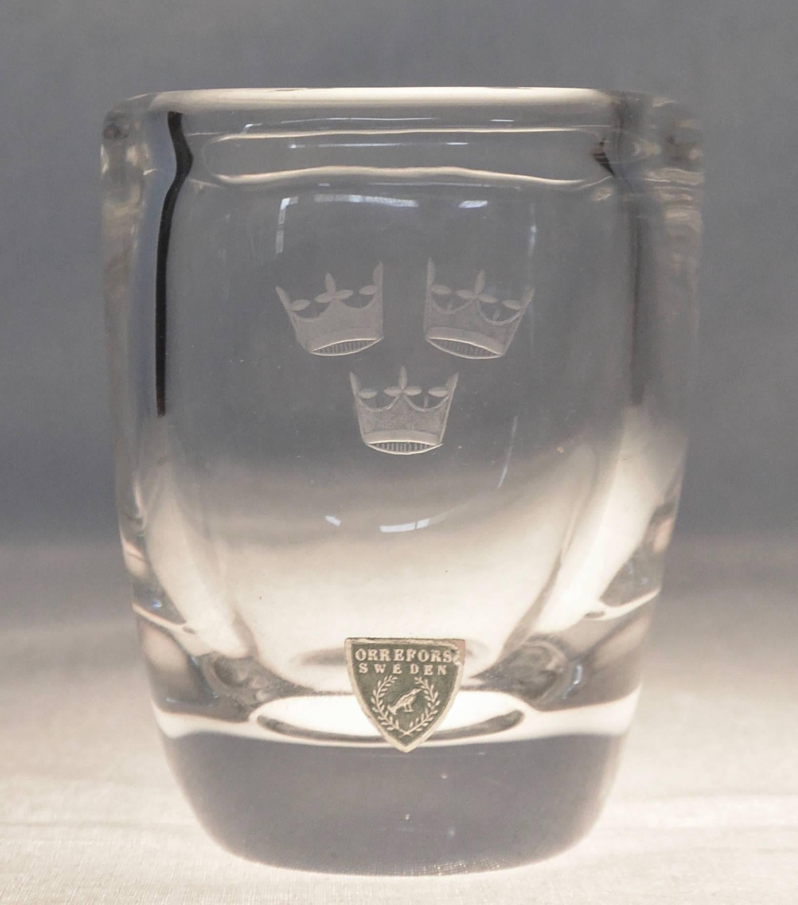 Vintage Orrefors Swedish American Line crystal vase with original label. Heavy crystal etched with the three crowns logo of the shipping line. Signed 