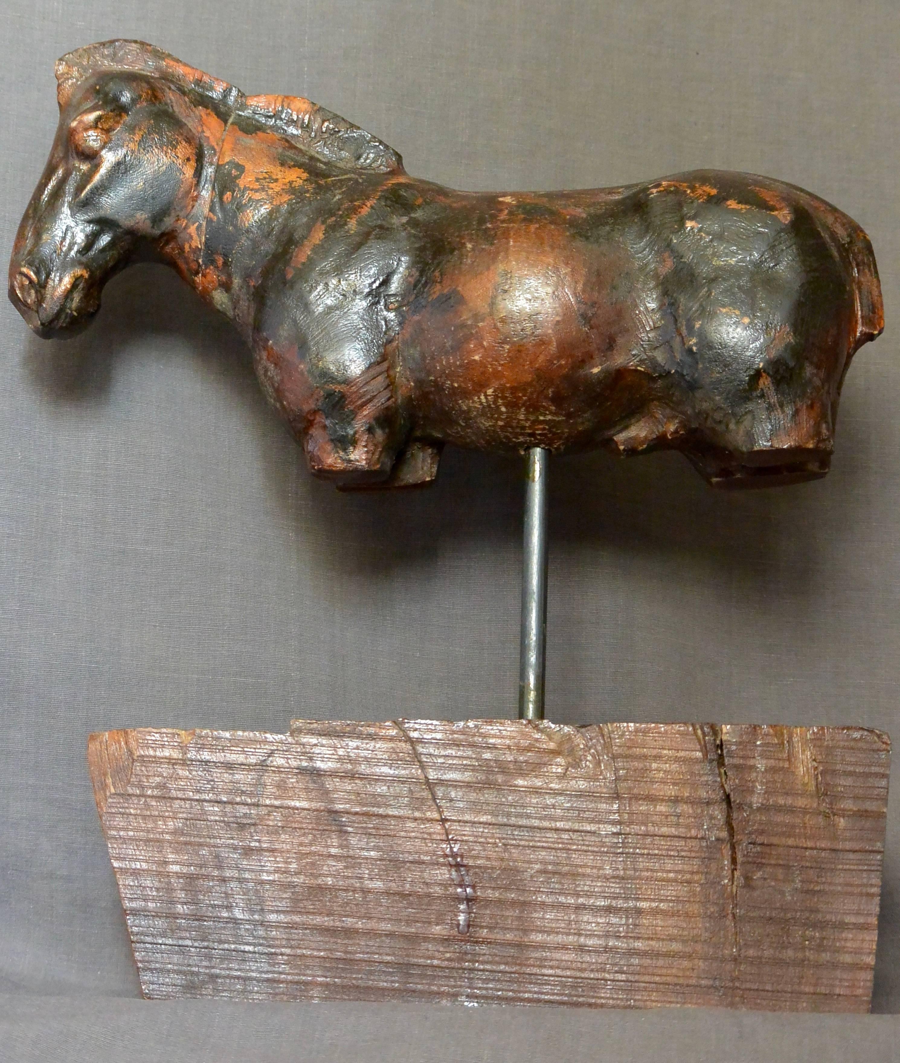 Italian carved poplar wood horse sculpture on walnut base, in original antique condition on antique walnut base. Italy, circa 1800. 
Dimensions: 15” H x 13” L x 5” W at base.
 