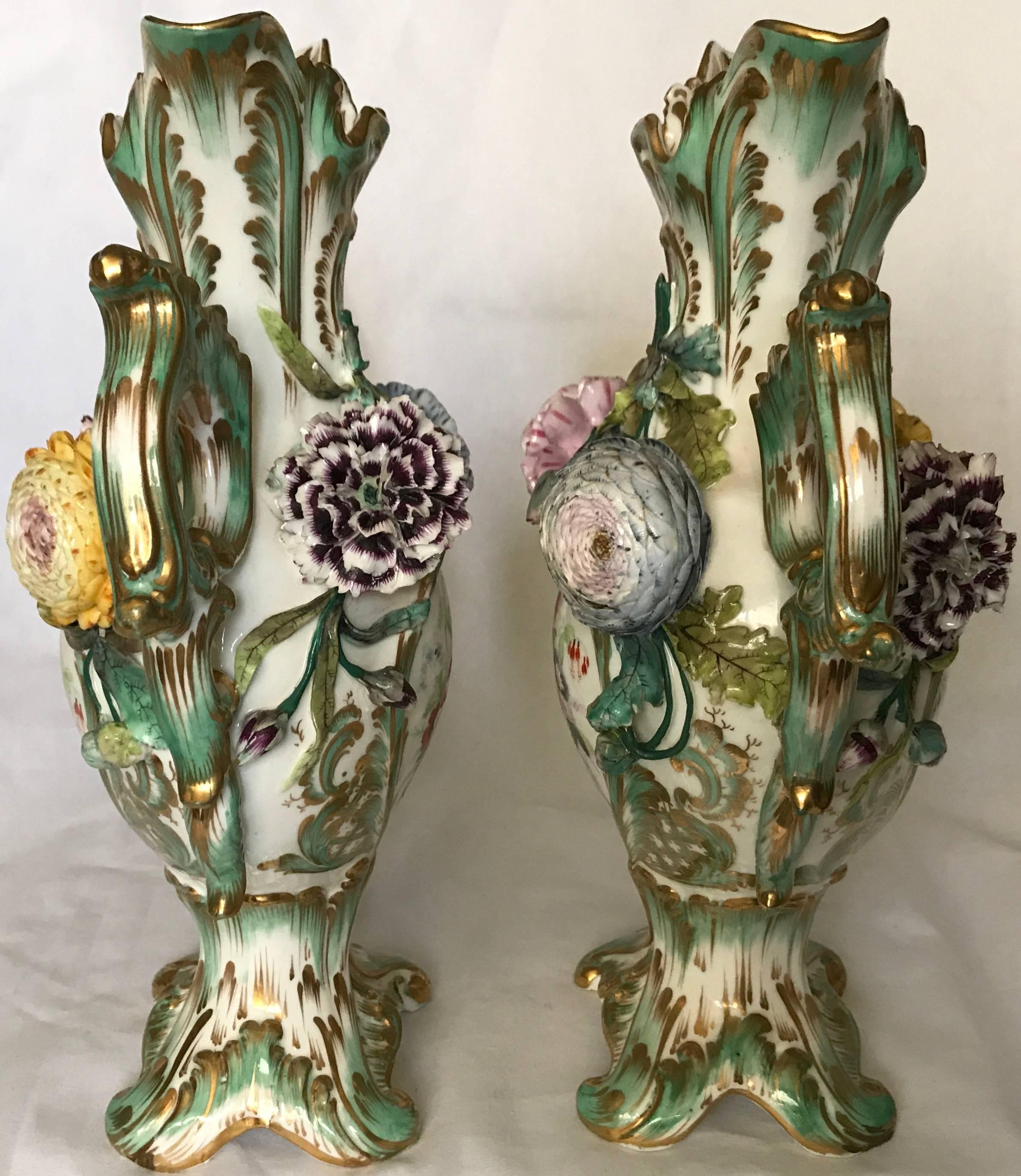 Pair green and gilt painted Rockingham vases.  Pair vases with exceptional figured flowers in excellent condition. England, circa 1840
Dimensions: 8