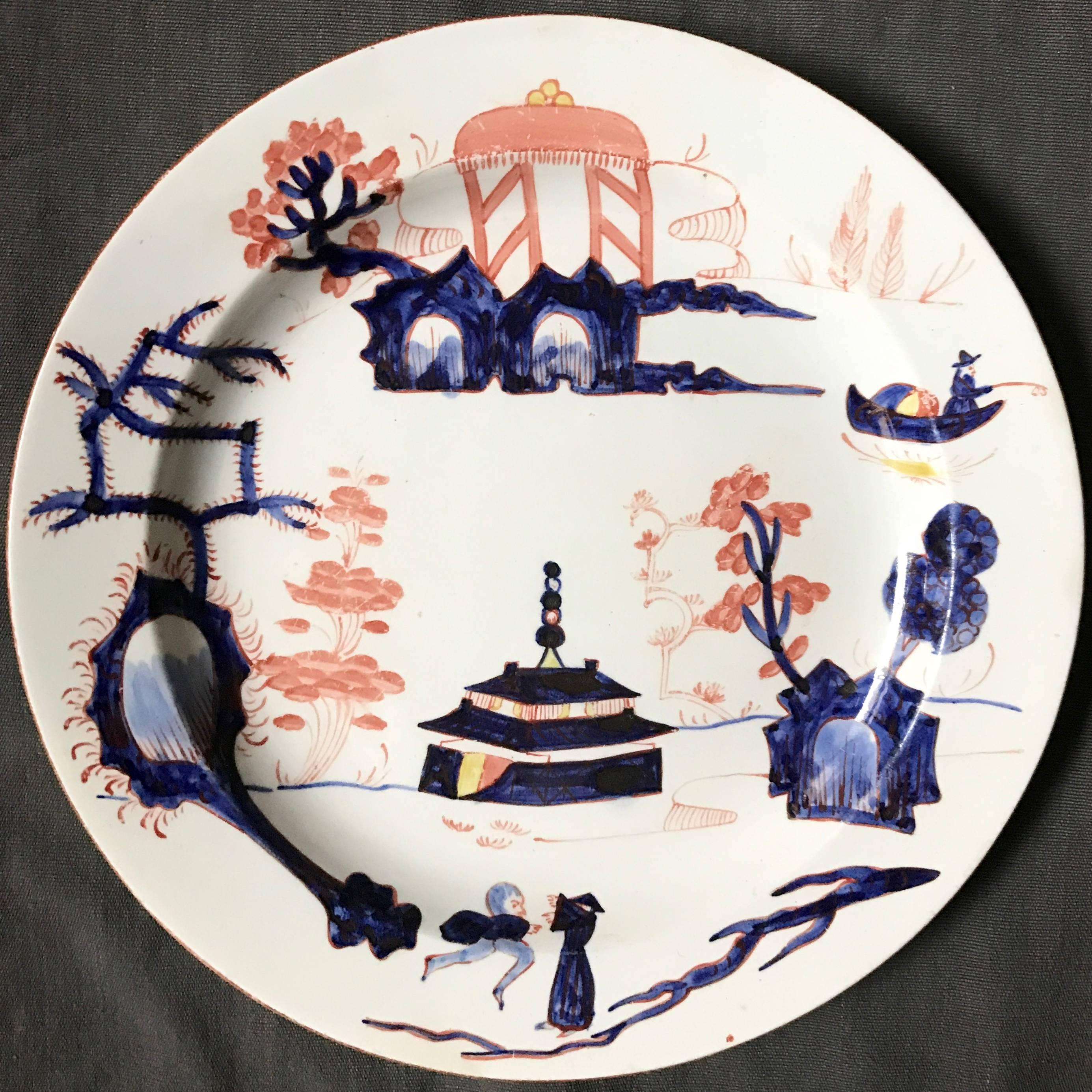 Pair Wedgwood chinoiserie plates. Rare pair of early Wedgwood chinoiserie pearlware plates with fantastical Oriental imagery in cobalt underglaze blue, iron red and yellow in approximation of the 