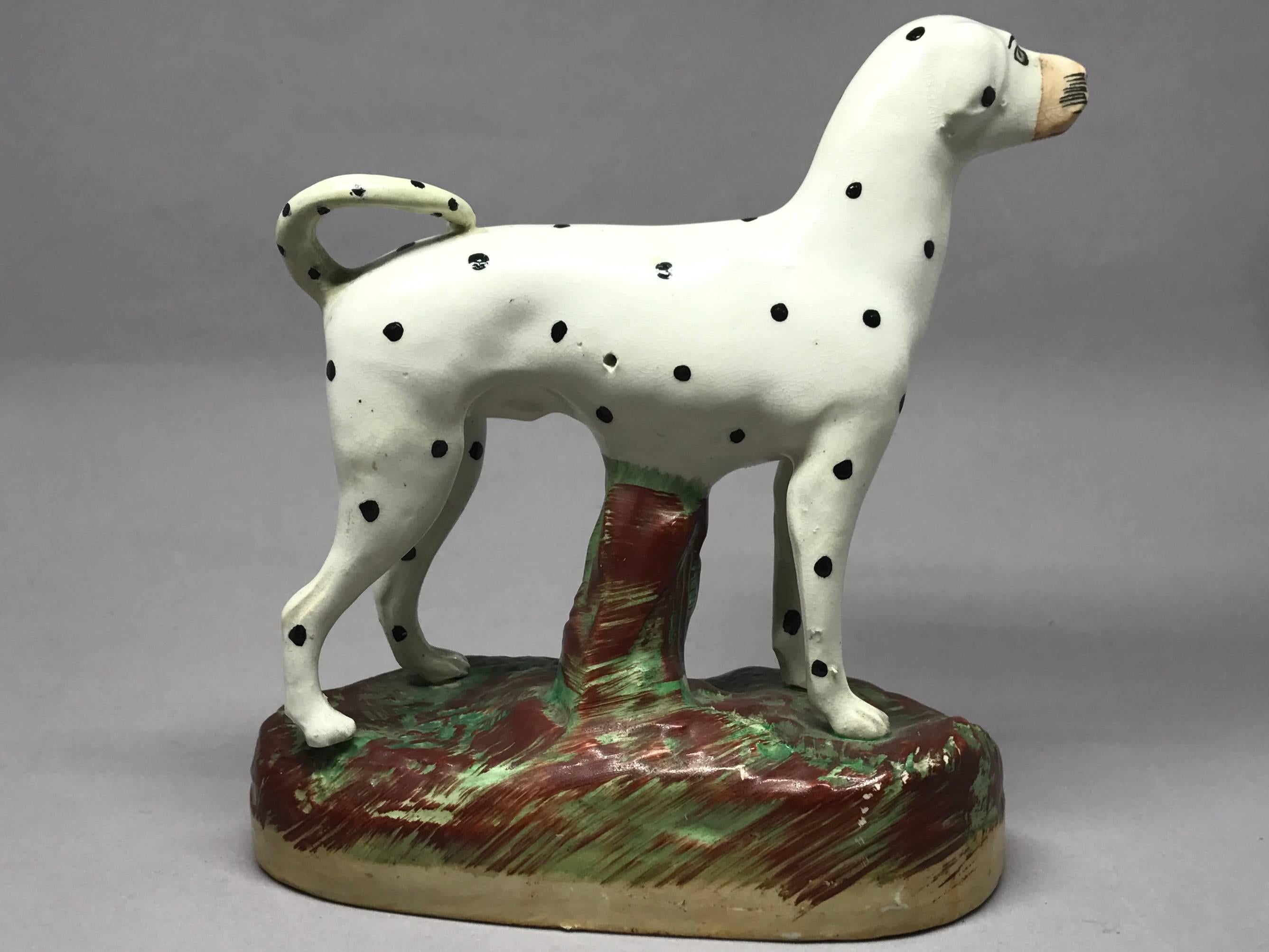 Staffordshire Dalmatian dog. Antique Staffordshire pottery Dalmatian on painted base. England, mid-19th century.
Dimensions: 6.5