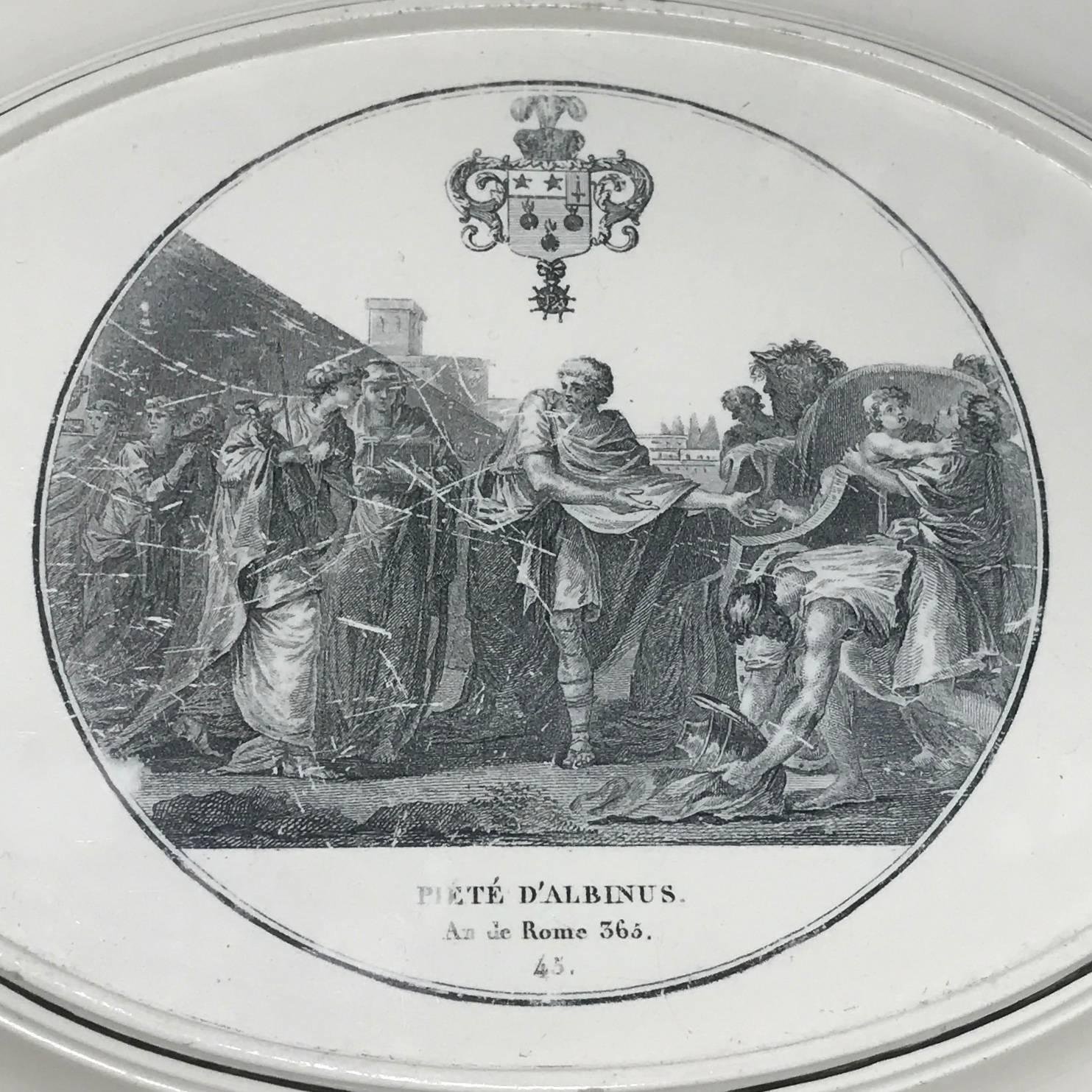 Large Creil plate. Antique neoclassical oval creamware serving platter from the "An de Rome" series, "The Piety of Albinus" with swan and armorial cartouche border. Impressed Creil, France, early 1800s.
Dimension: 16" W x