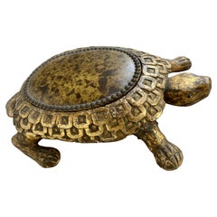 Antico poggiapiedi tartaruga intagliato e dorato