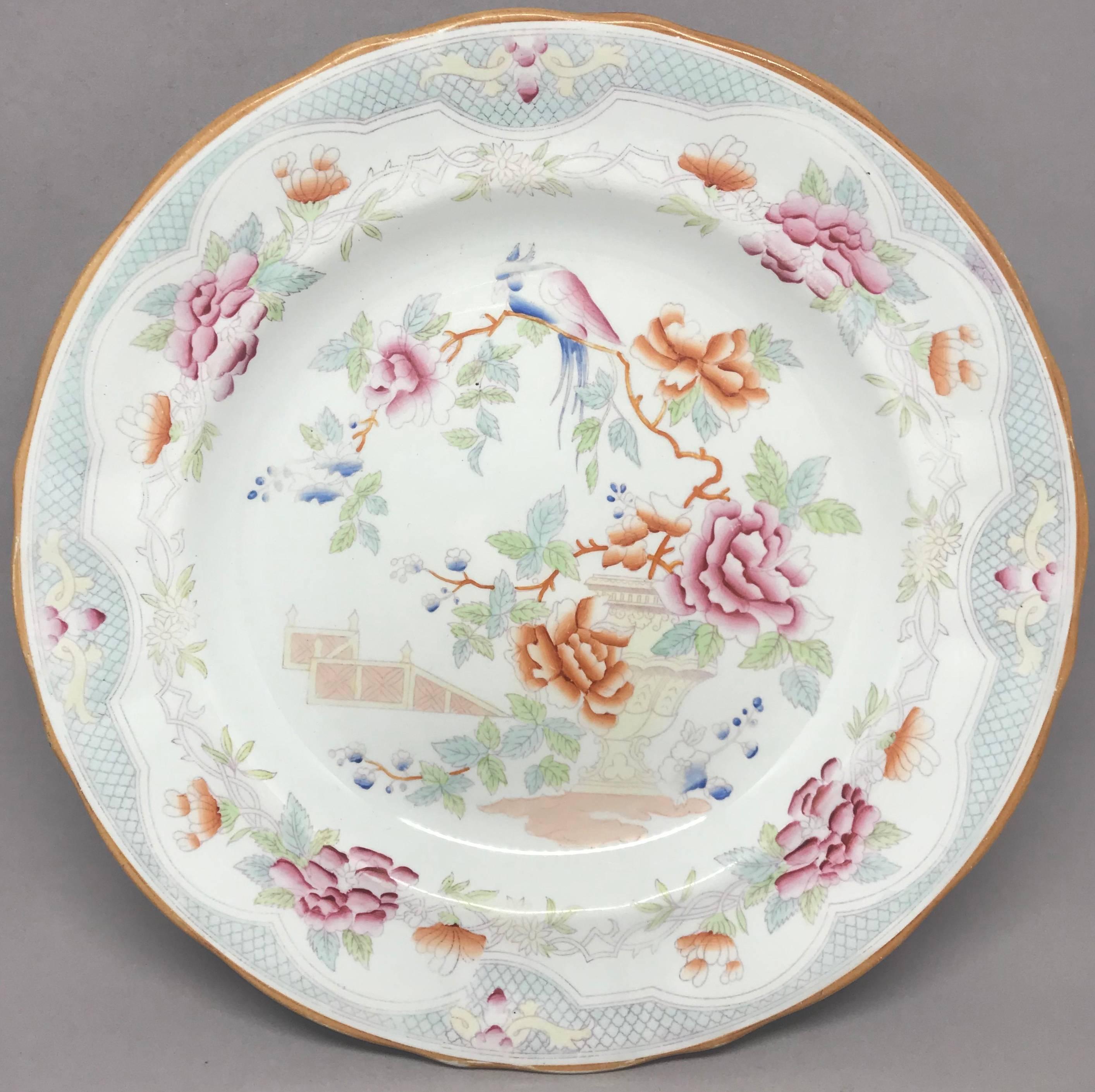 Dutch chinoiserie plate.  Antique orange rimmed Dutch chinoiserie floral plate with under glaze stamp for 