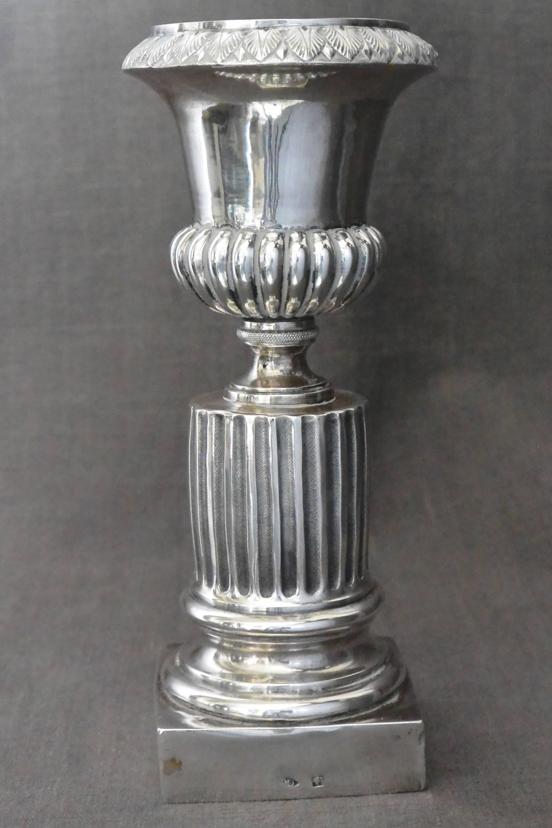 Italian Neoclassical Silver Vase. Neapolitan sterling silver acanthus leaf-topped urn on fluted column pedestal with Italian sterling hallmarks, stamped N8, Italy, circa 1870.
Dimension: 2.25