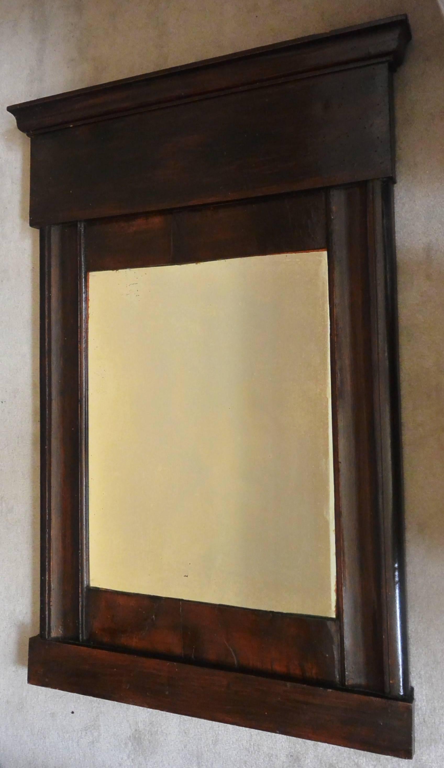 Italian Walnut Mirror. Provincial Empire walnut mirror with later antique plate, with clean modern classic lines.   Italy, circa 1820.
Dimension: 30.5