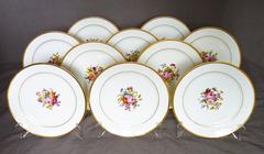 Set of Ten Empire Floral Decorated Gilt Banded Plates