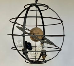 Ciondolo a forma di sfera armillare italiana
