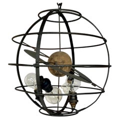 Ciondolo a forma di sfera armillare italiana