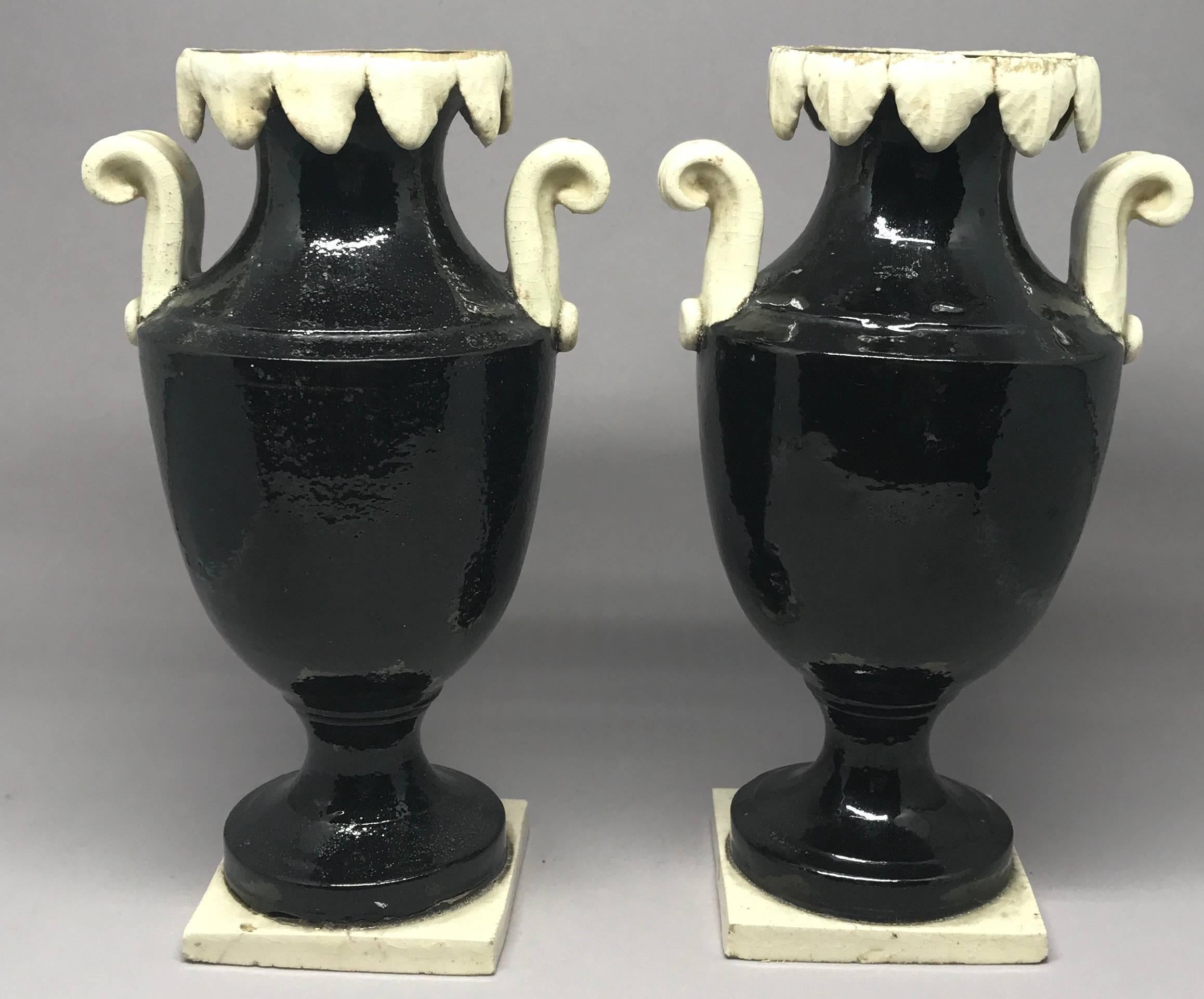 Pair of Neoclassical Black and White Giustiniani Urns In Good Condition For Sale In New York, NY