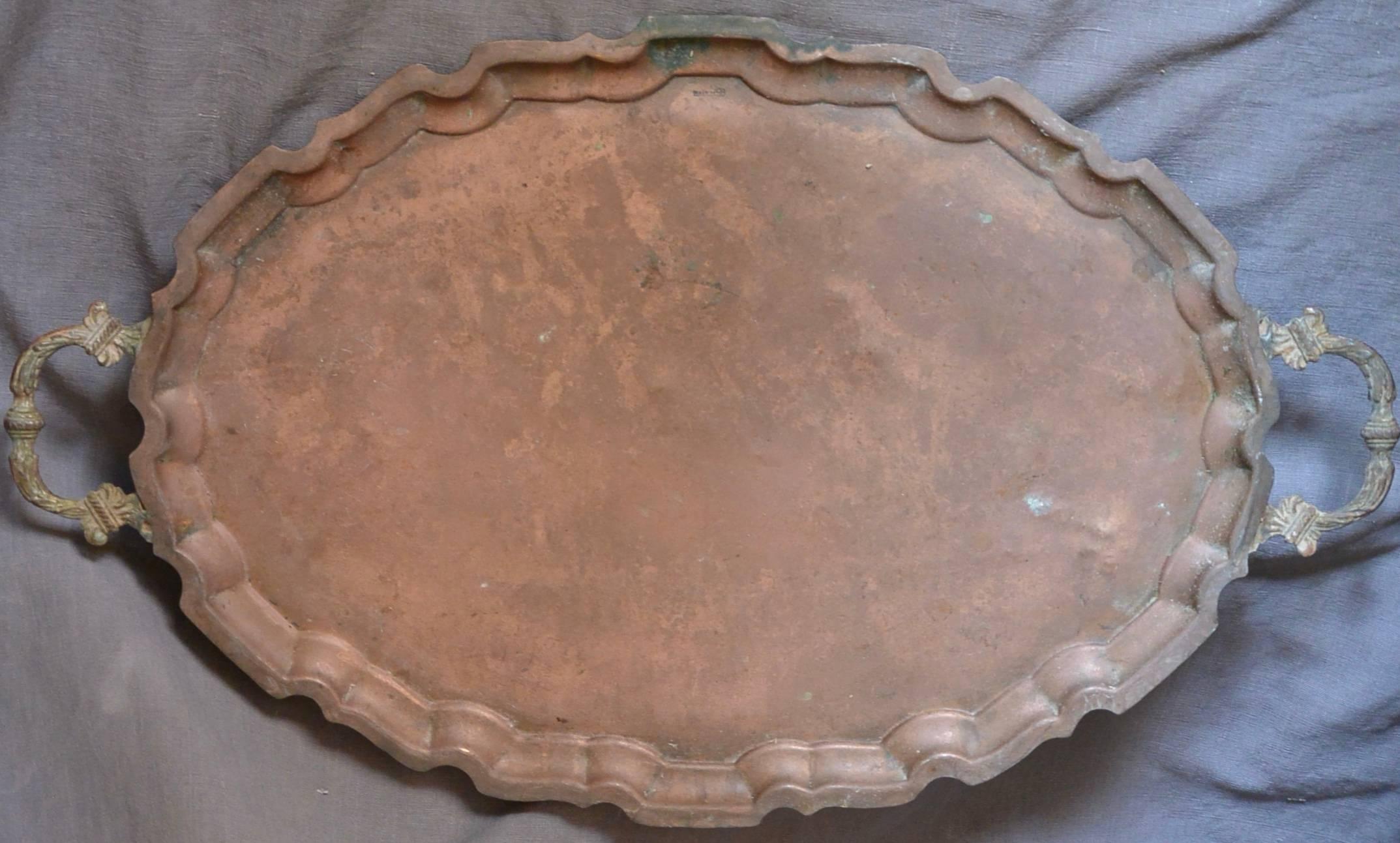 Oval shaped two-handled tray with scalloped edge, Egypt, circa 1930
Dimensions: 25