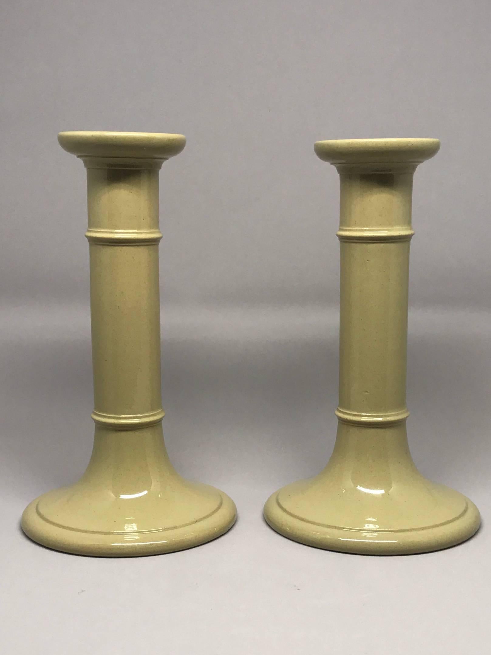 Pair drabware candlesticks. Clean and crisp lines in a simple undecorated color perfect in a modern or classical setting. England mid-19th century. 
Dimensions: 4.75