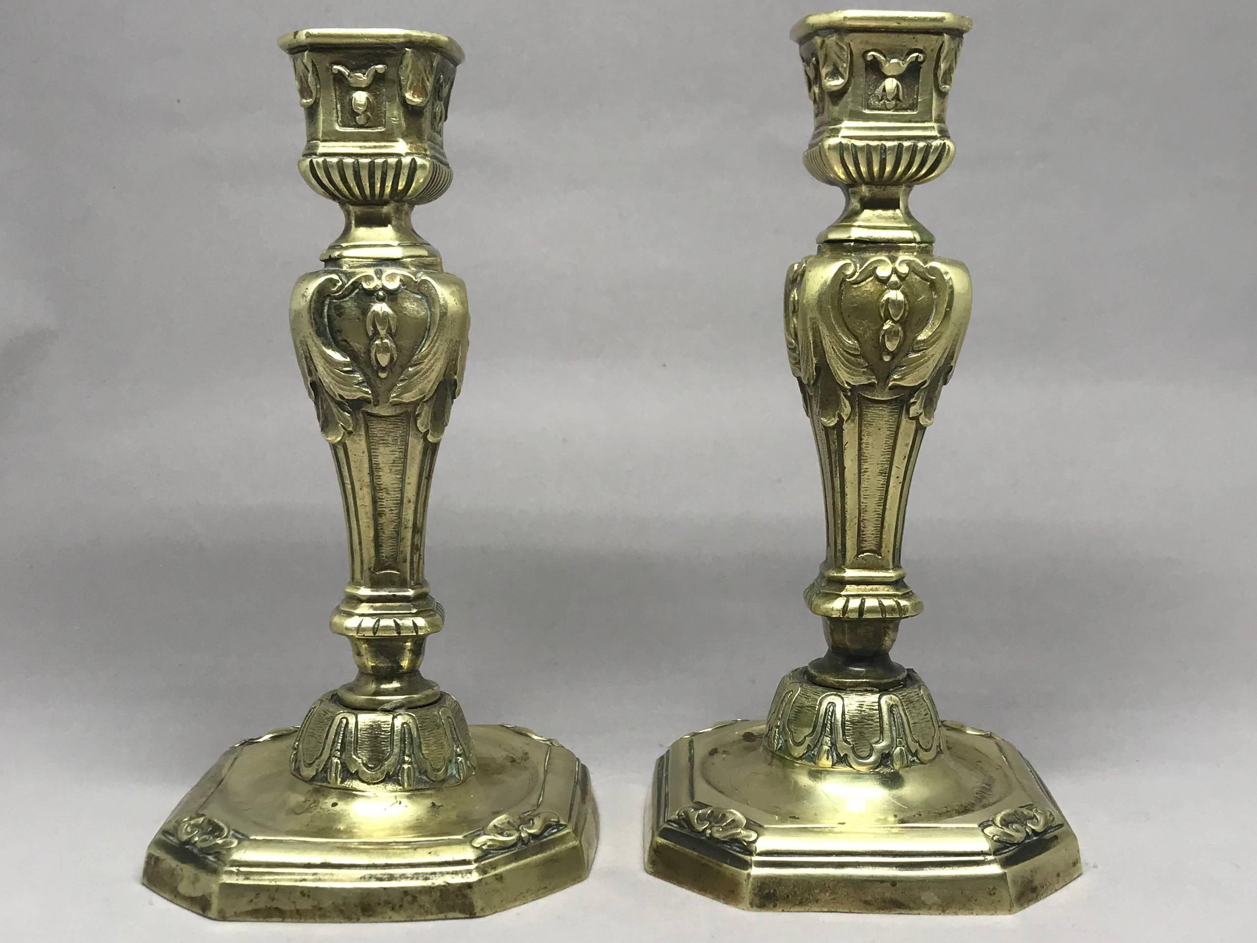 Pair of Louis XIV candlesticks. Louis Quatorze heavy brass candlesticks in three parts, their smaller size indicative of their original use on the candle slides of a bouillotte table. France, early 18th century
Dimensions: 3.25" W x 3.25"
