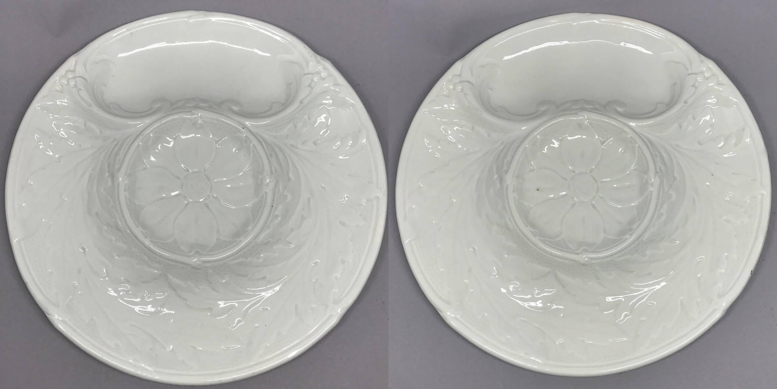 Set of ten French white plates. Handsome white serving plates with impressions for serving artichokes or for modern wall display, with markings for Gien, France, early 20th century. 
Dimensions: 9