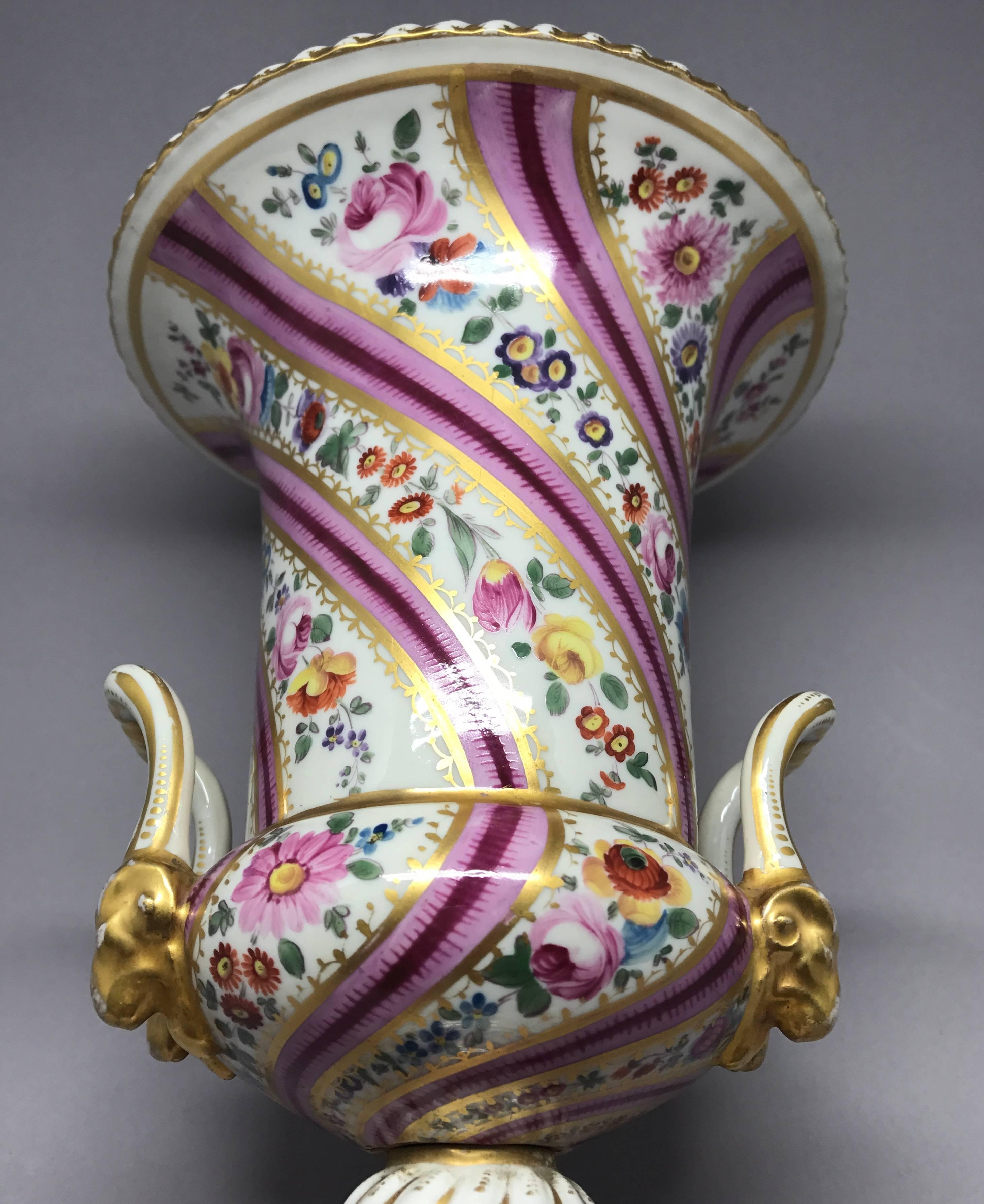 Pair Pink Floral and Gilt Porcelain Painted Urns In Good Condition For Sale In New York, NY