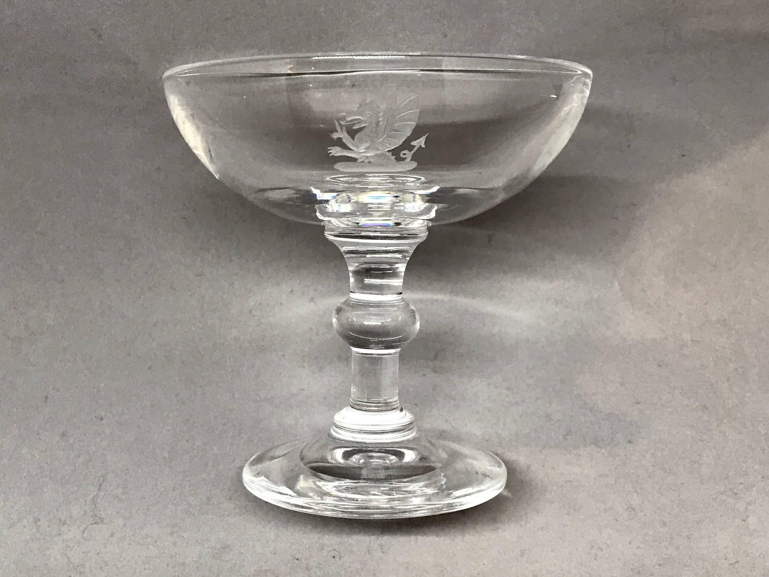 Vintage etched crystal Steuben champagne coupe. Champagne coupe with etched dragon design. Signed 