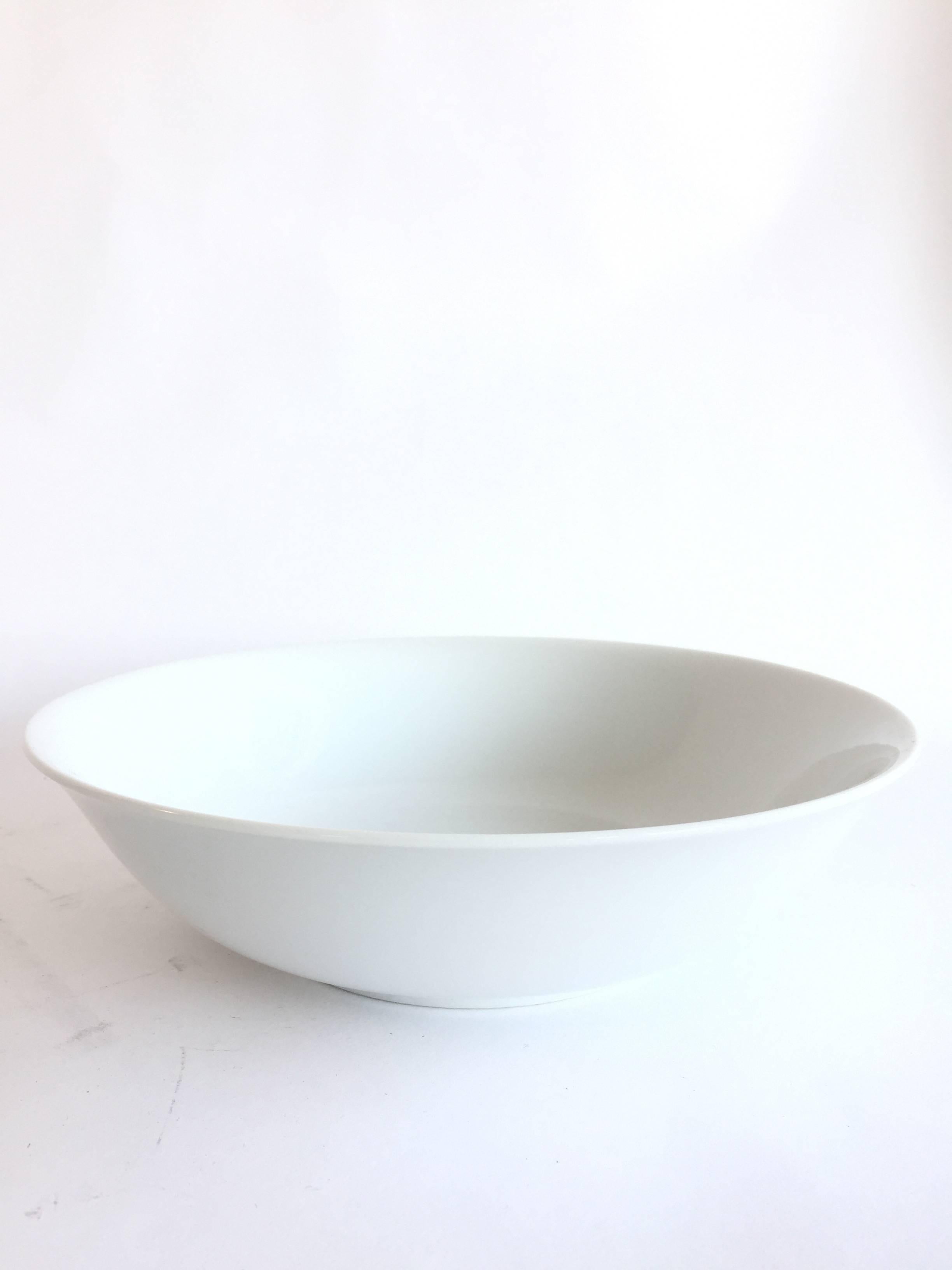 Delicate dinnerware set by Raymond Loewy for Continental China. Includes nine full sets with pieces of up to 12.

Dimensions given are for dinner plates. 

Dinner plates nine
Salad plates: 12
Saucers: 12
Small bowls six
Medium bowls:
