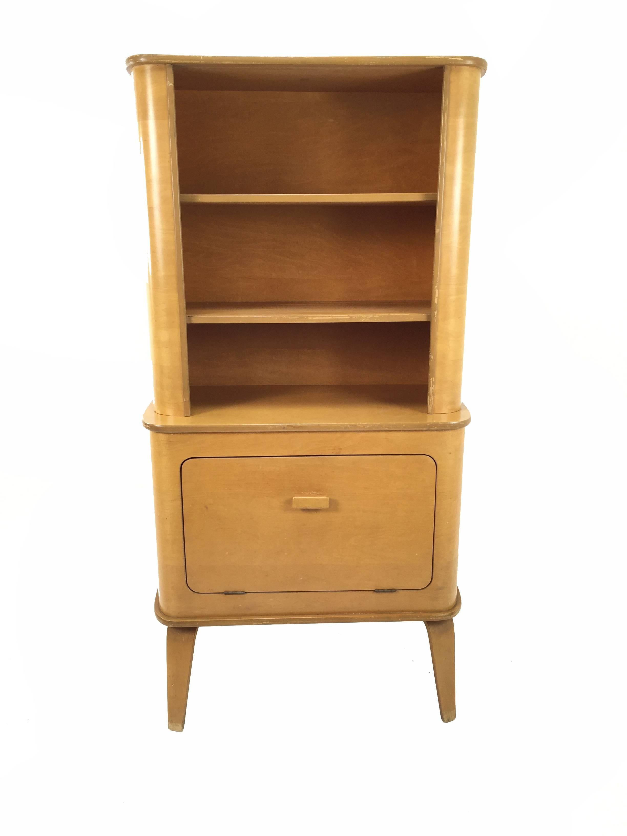 Thaden Jordan bar cabinet or hutch in blonde birch veneer bent plywood. Produced for four years just after WW2 by Herbert von Thaden and Donal Lewis Jordan for their company. See matching cabinet and dinette set in our other listings.