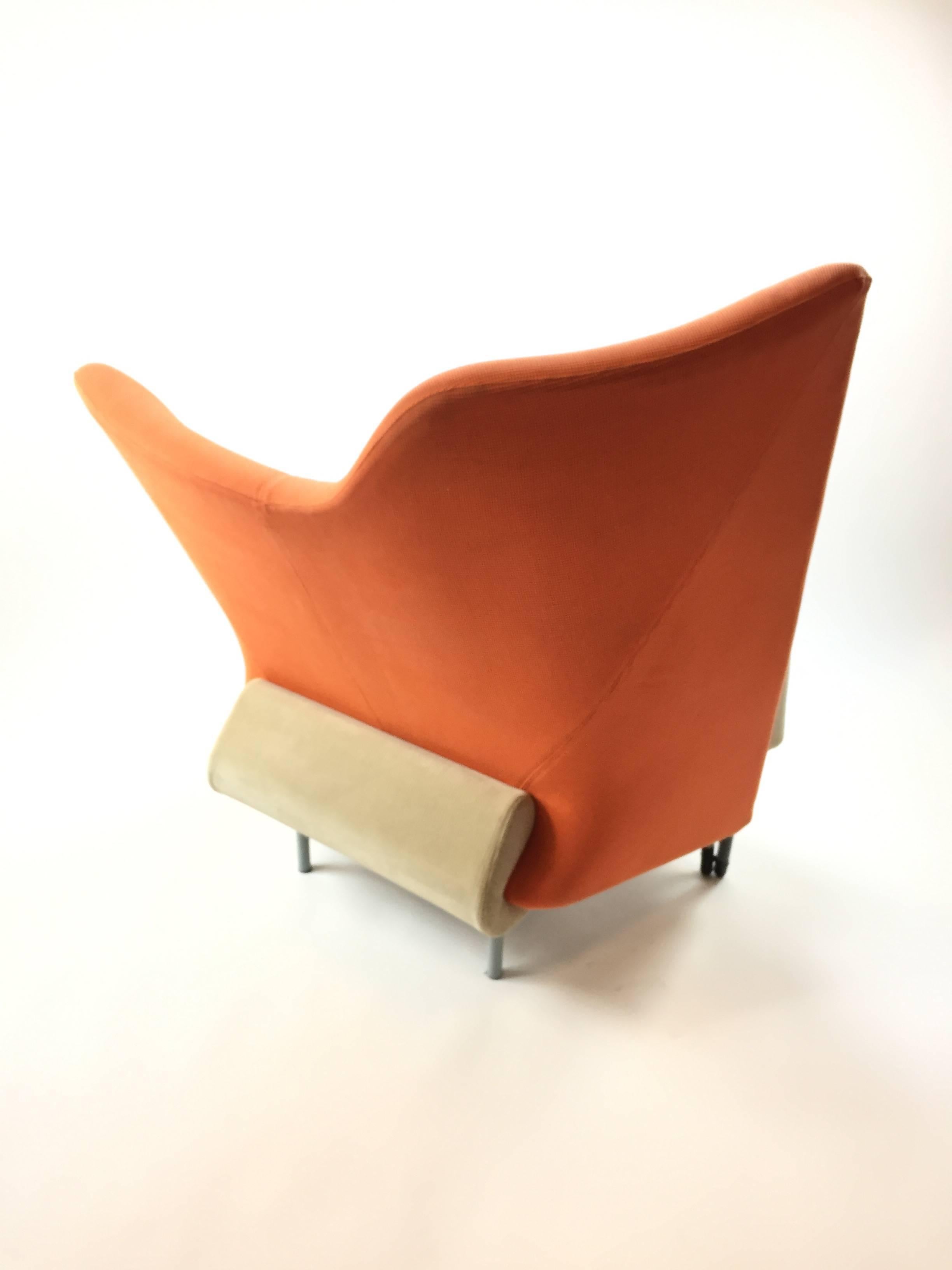 Pair of wild Memphis style torso chairs designed by Paolo Deganello, circa 1982 and manufactured by Cassina. Almond pinstripe velour base fabric and heavy tweed orange and yellow upper. Good condition or reupholster on request. Price is as-is.