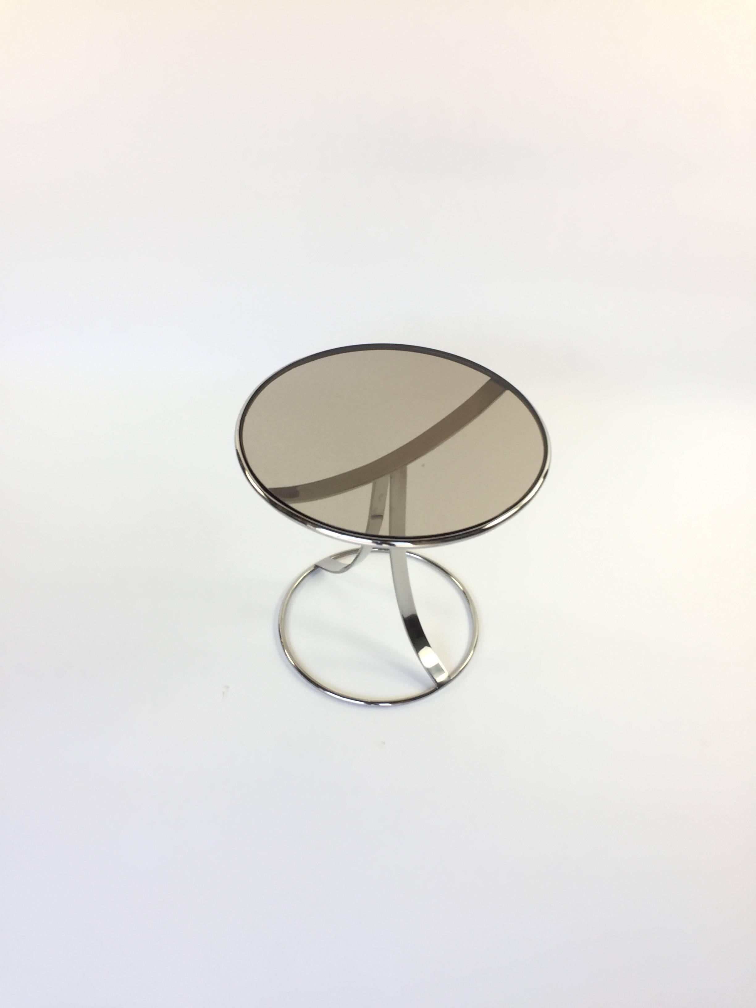 Gardner Leaver for steelcase ens table. Smoked glass top with polished stainless base.