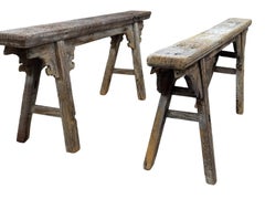 Pair of Chinese Provincial Weathered Elm Benches with Carved Brackets