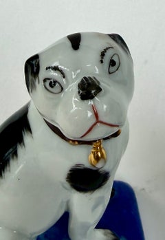 Pair of Porcelain Pug Dog Figurines on Cobalt Blue Bases, Late 19th Century