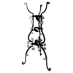 Continental Wrought Iron Tripod Plant Stand with Scrollwork and Foliage