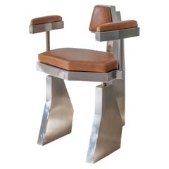 Sillón «Heron» de Vincent Decat: diseño moderno en piel y acero