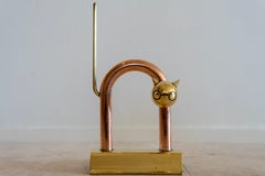 Walter Von Nessen, fermaporta "Gatto" in rame e ottone