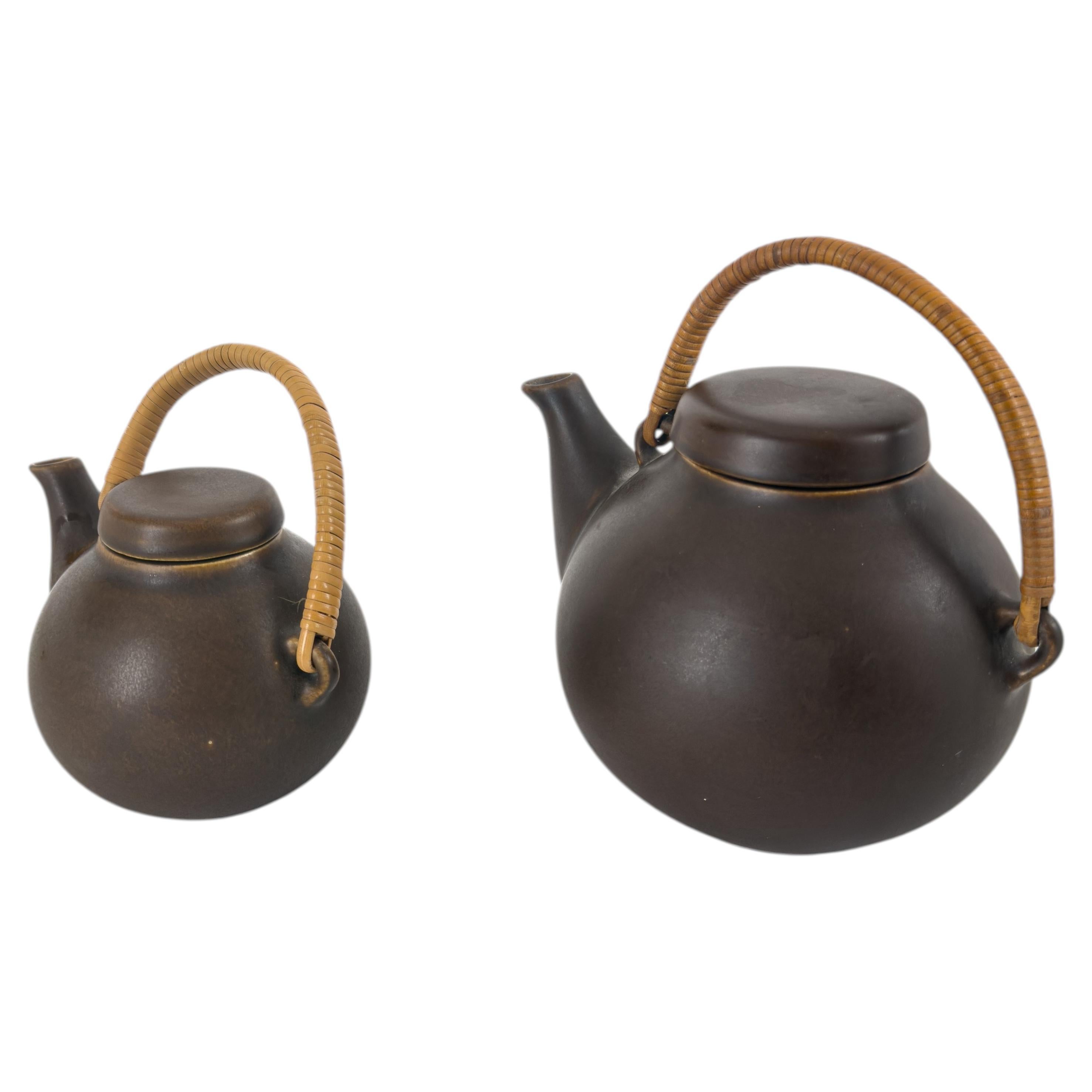 Arabia, Pair of Scandinavian Modern Stoneware Teapots with Woven Rattan Handles