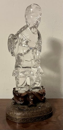 Figurine chinoise ancienne en cristal de roche sculpté représentant un immortel