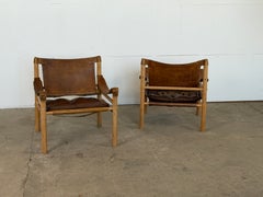 Pair of Arne Norell "Sirocco" Safari Chairs, Ash and Leather, Sweden