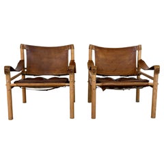 Pair of Arne Norell "Sirocco" Safari Chairs, Ash and Leather, Sweden