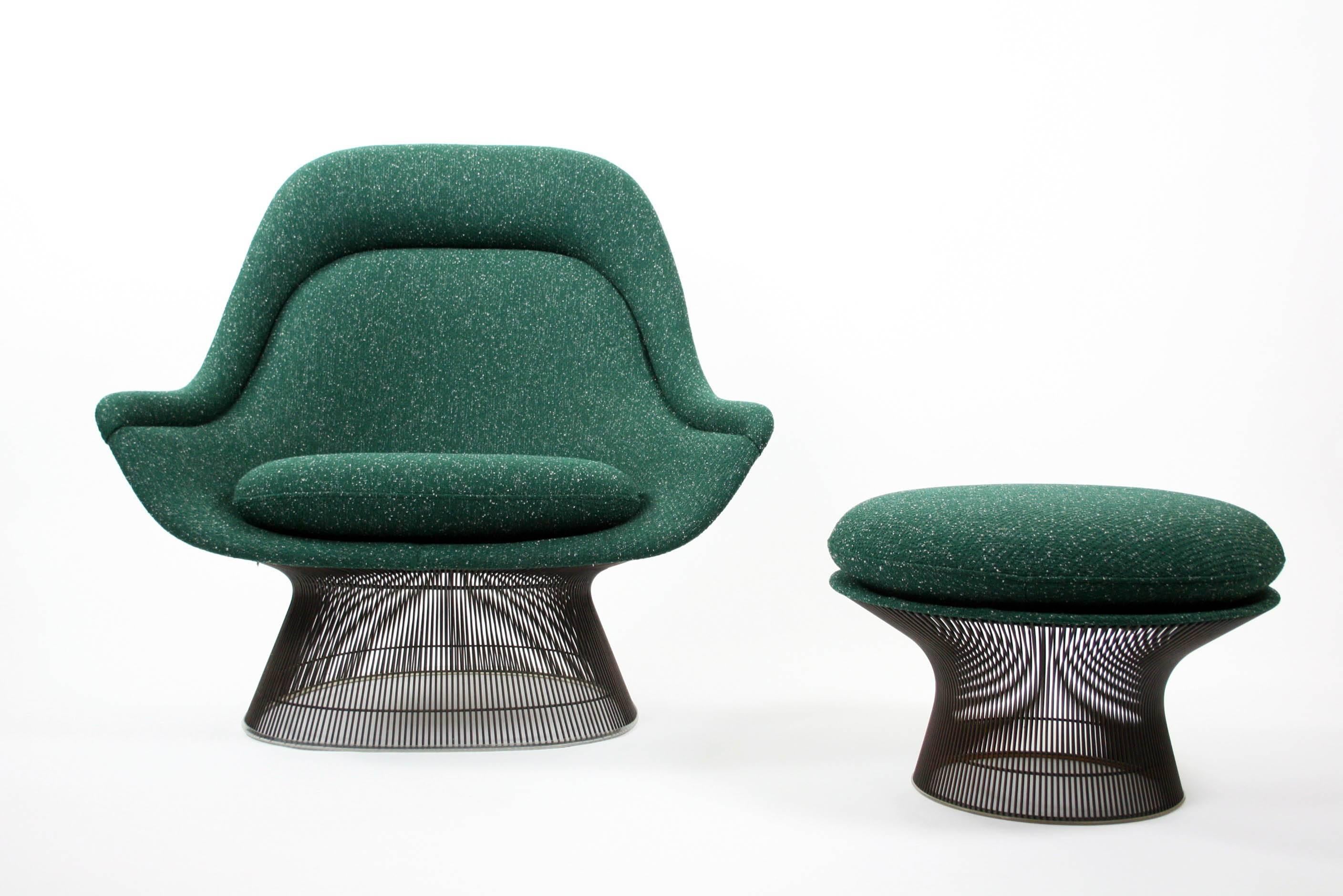 A fantastic oversize original vintage lounge chair and ottoman designed by Warren Platner for Knoll International. This amazing set comes completely professionally redone in a very high end emerald green fabric. The bronze finish wire frame shows