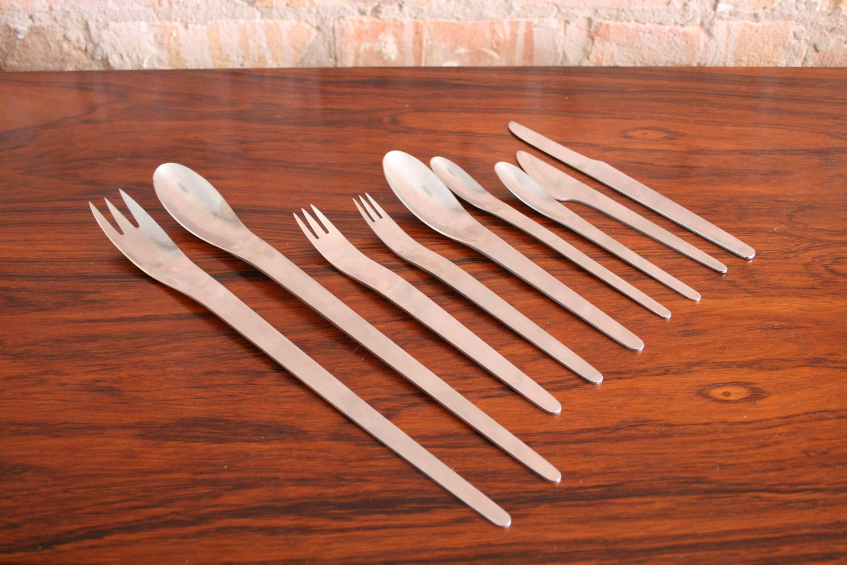 All signed A Michelsen, Denmark
The set includes service for 11:

One pair of large servers
11 large forks
11 small forks
11 large spoons
11 small spoons
11 tea spoons
11 butter knives
11 small knives.