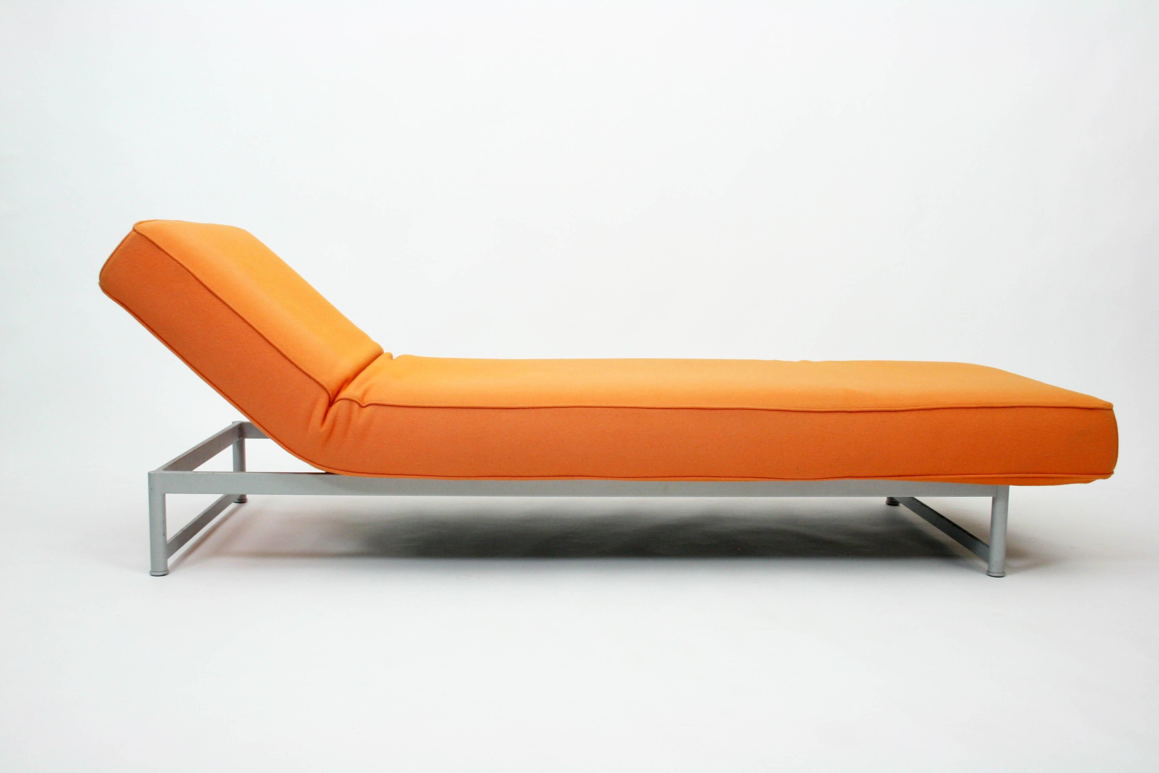 Piero Lissoni Reef daybed chaise in orange felt for Cassina. The chaise is adjustable. The bench has a suitable seat for a chaise-longue configuration; one end part can be tilted at four different positions to be used as headrest, the other end part