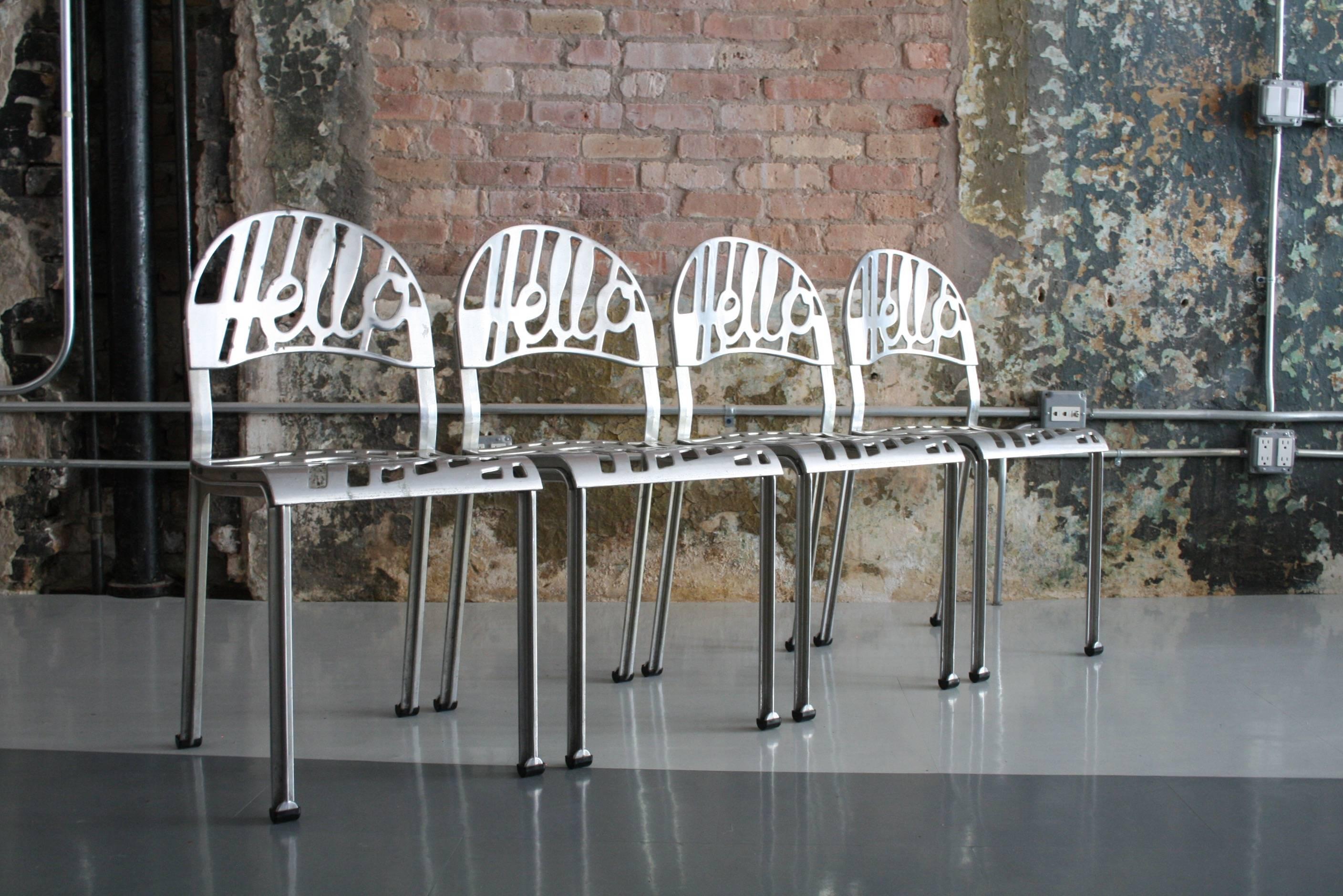 Eight Hello There chairs designed by Jeremy Harvey for Artifort in 1978 in good condition with overall even wear and patina from use. 

Artifort:
United Kingdom / The Netherlands, 1978.
Cast aluminium.
Measures: 15 W x 16 D x 31 H in (38 x 41 x