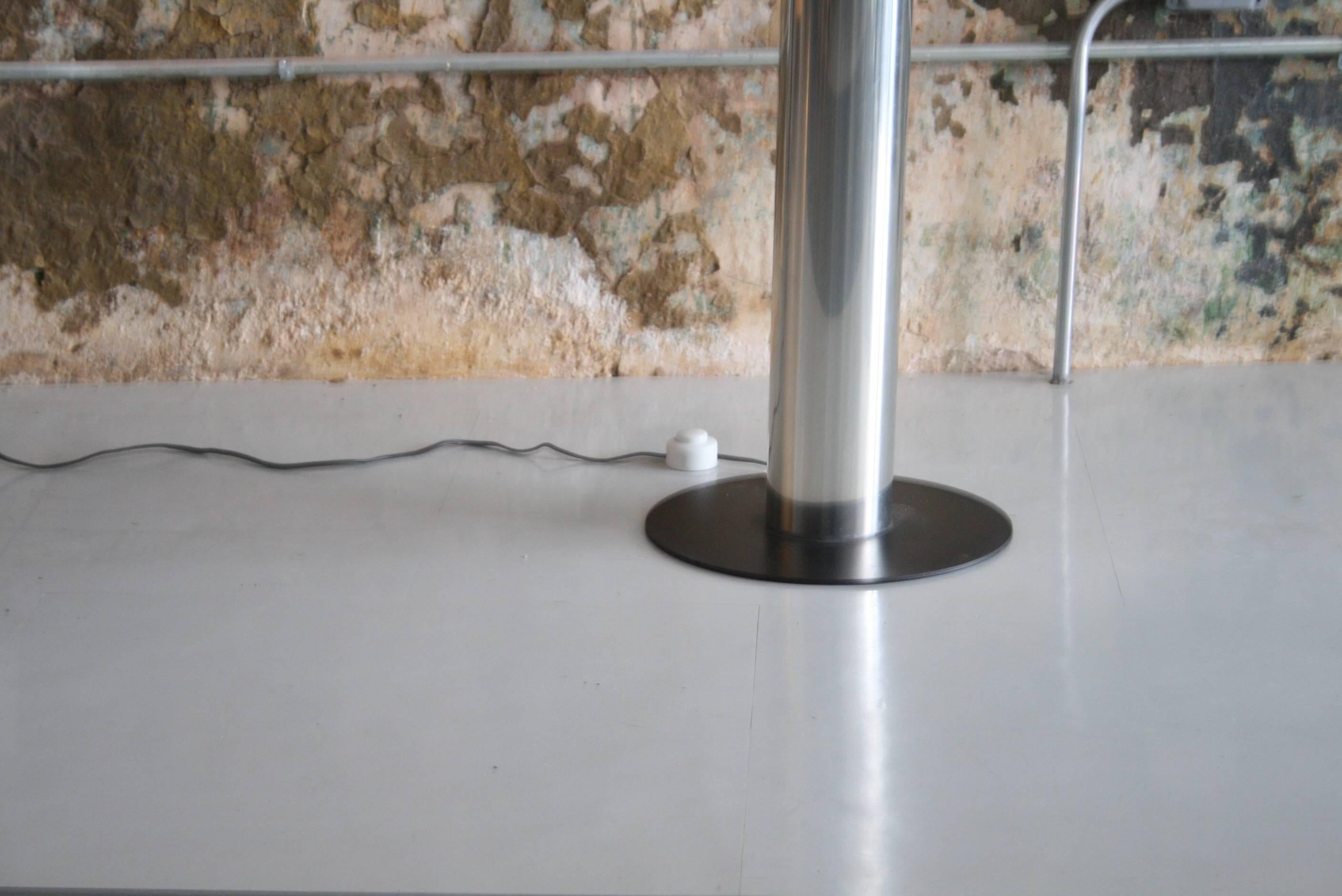 Minimalist floor lamp by designer and architect Paul Mayen for Habitat with glass shade and metal cylindrical base.