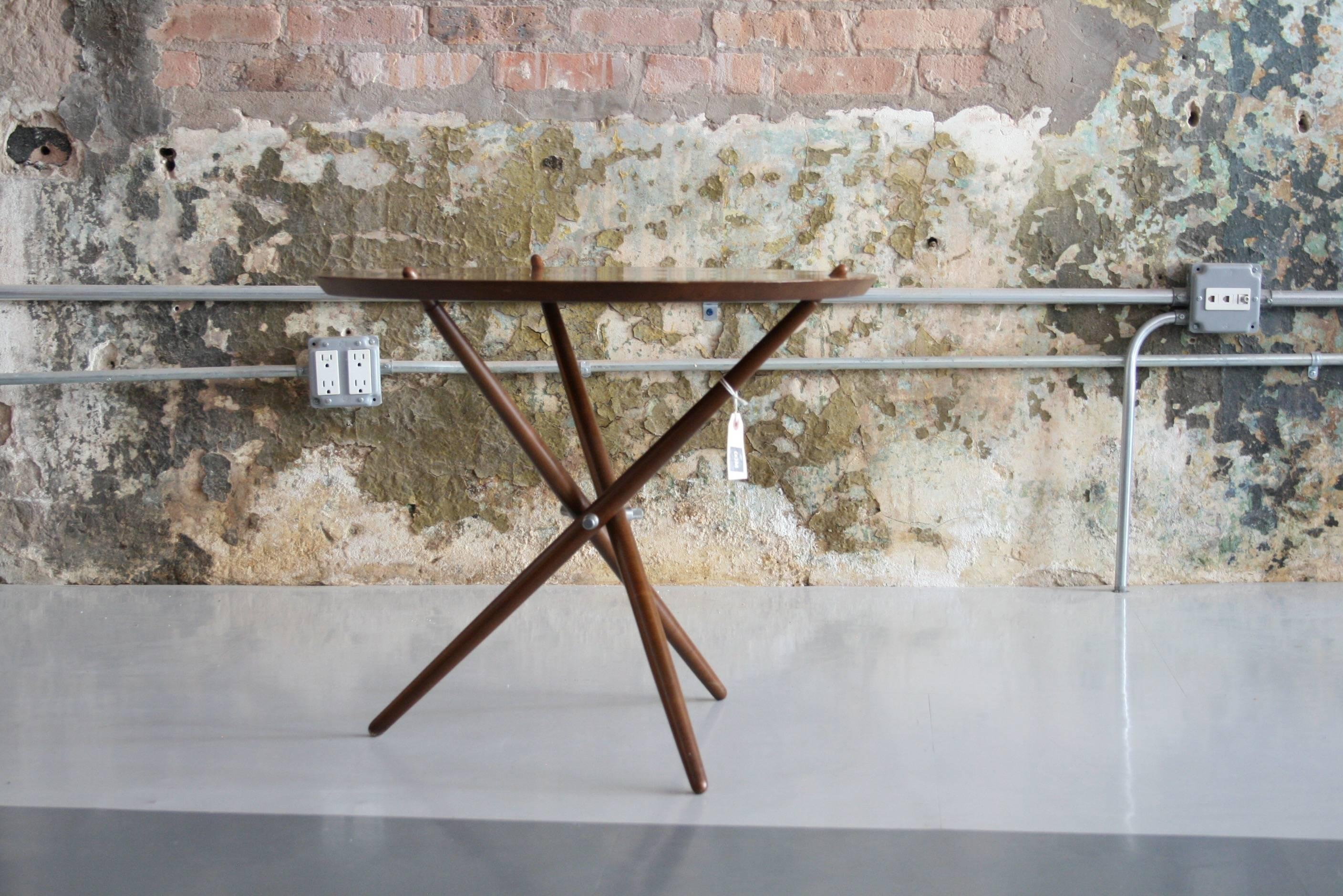 Rare 1948 Hans Bellman Swiss Modernist tripod table for Wohnbedarf imported by Knoll in great condition. 

The Swiss designer Hans Bellman was a student at the Bauhaus from 1931-1933 where he met Ludvig Mies van der Rohe. After graduating,