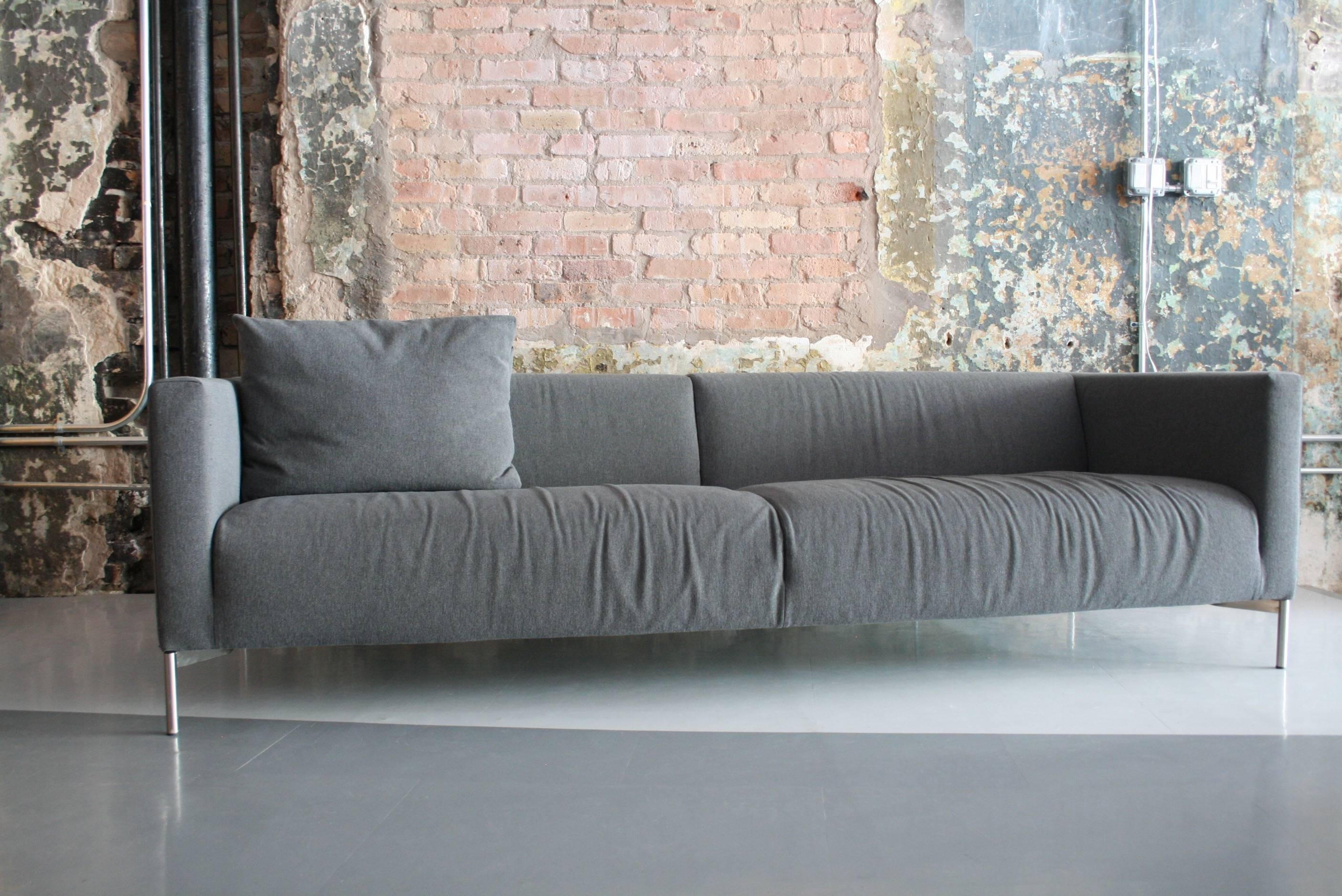Piero Lissoni twin sofa for Living Divani Italy in gray Maharam wool upholstery. The sofa is very comfortable and in great condition. This model was designed in 2000 by Piero Lissoni.