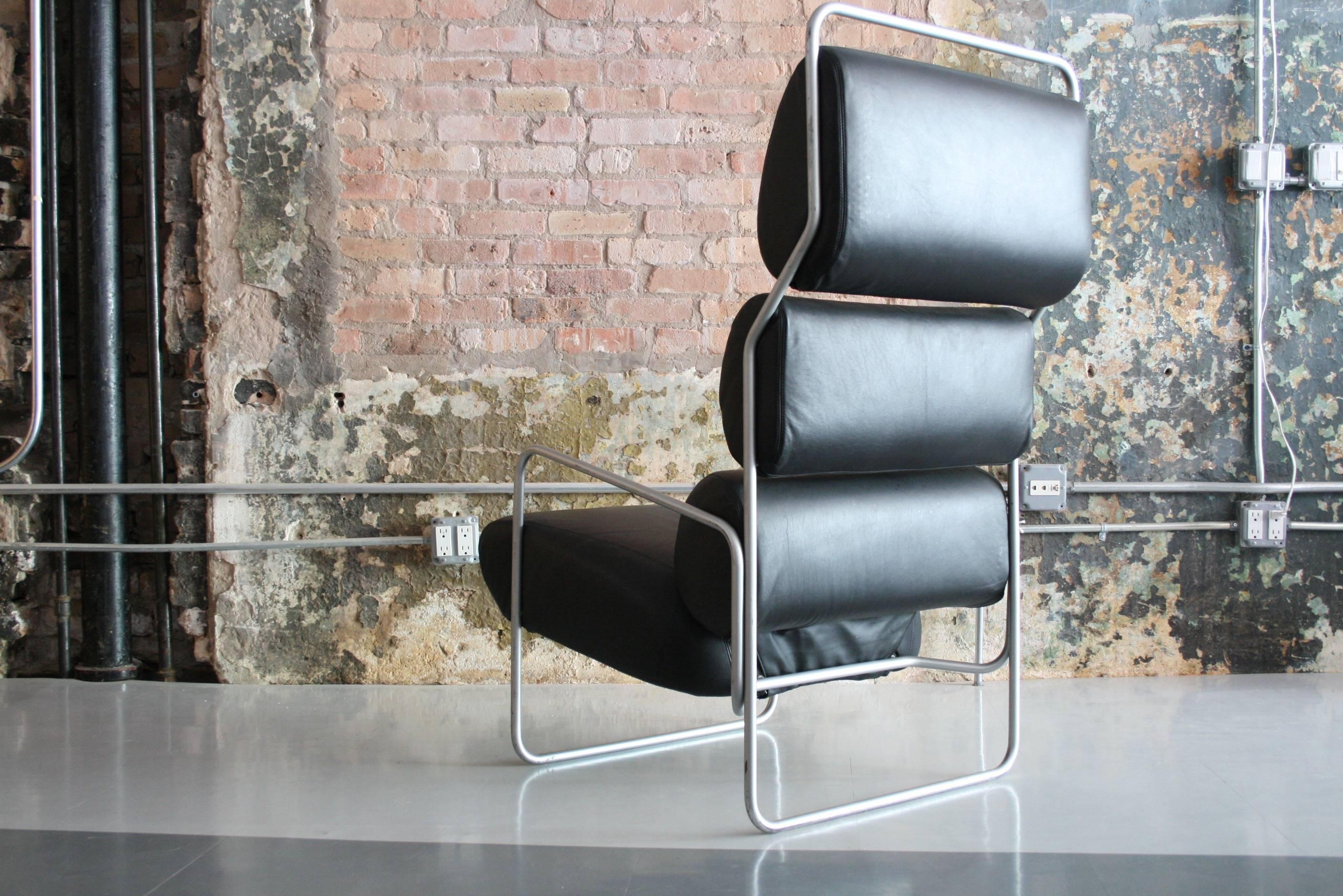 Vintage 1982 San Carlo model armchair in leather designed by Achille Castiglioni for Driade, Italy. The leather is in excellent condition. The Frame has some scratches and wear from use.