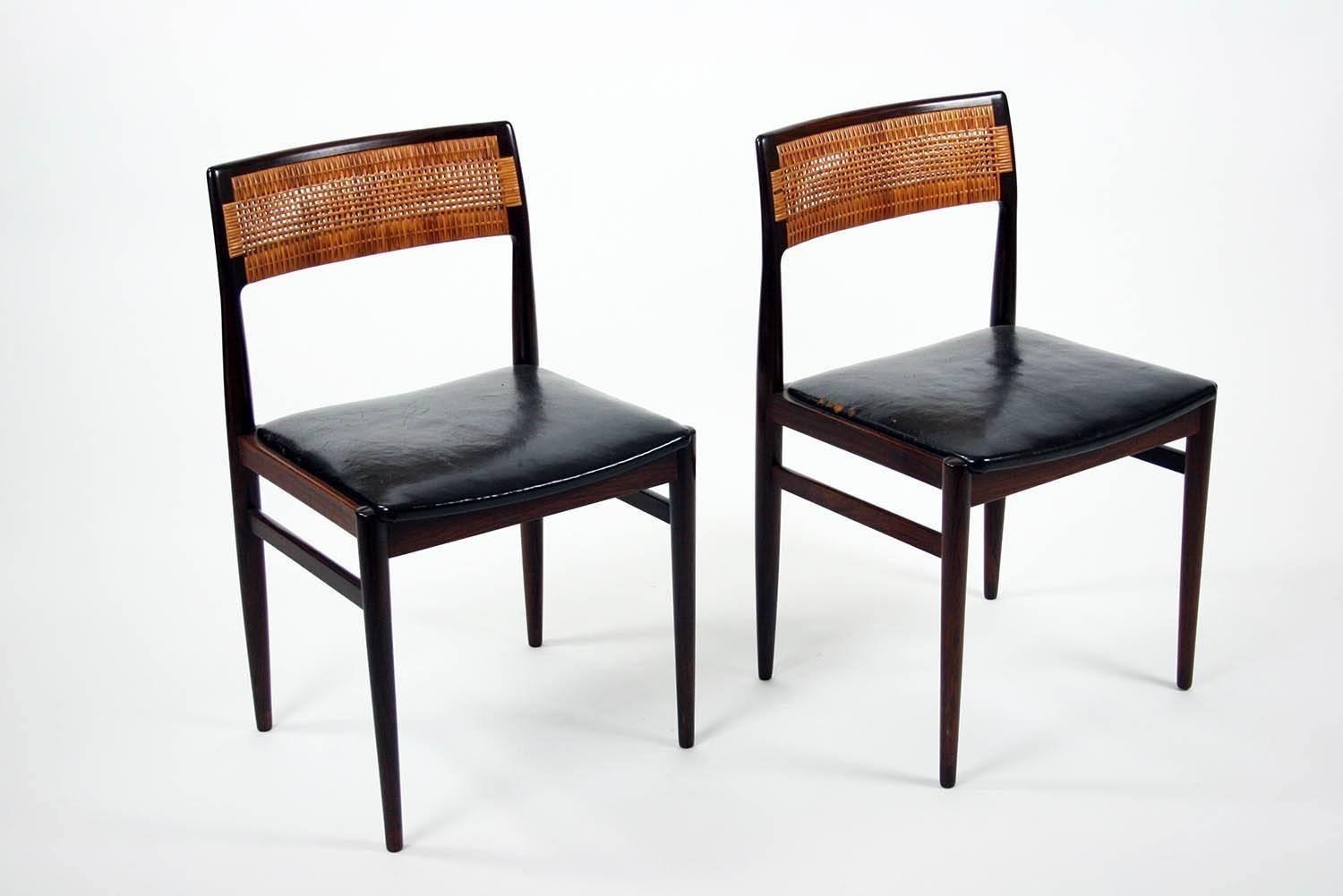 Architect Erik Wørts rosewood model w26 side chair with leather seats and rattan wrap back. Denmark.