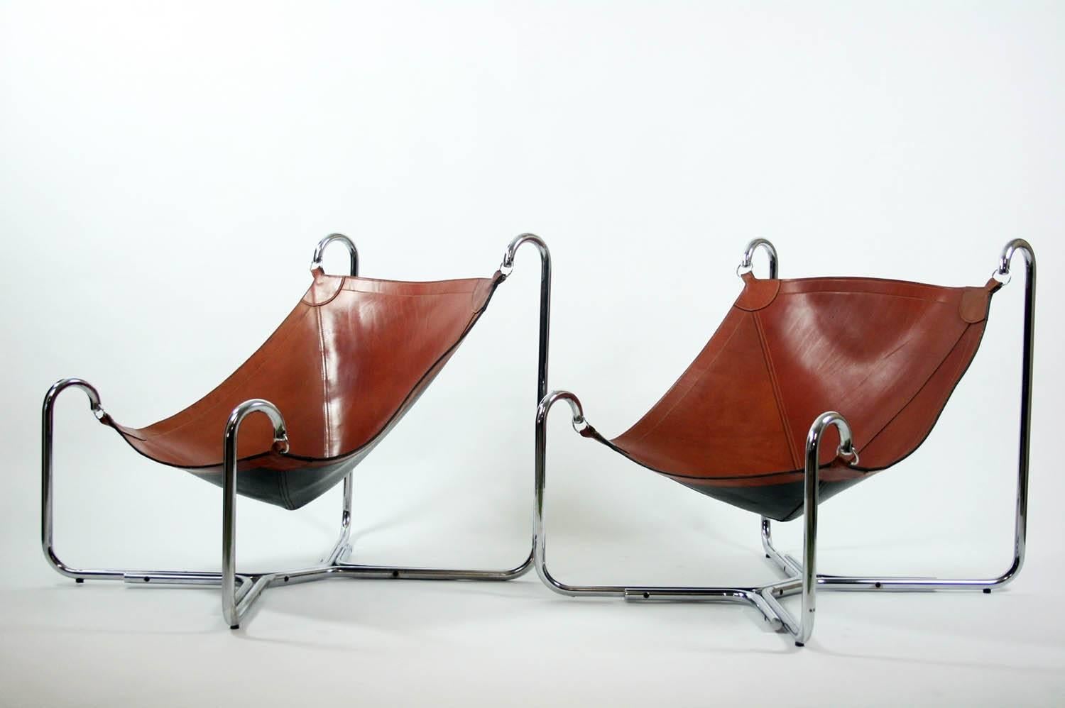 Pair of original vintage Baffo lounge chairs designed in 1969 by Gianni Pareschi and Ezio Didone for Busnelli, Italy. Both chairs are in original leather with beautiful patina.
